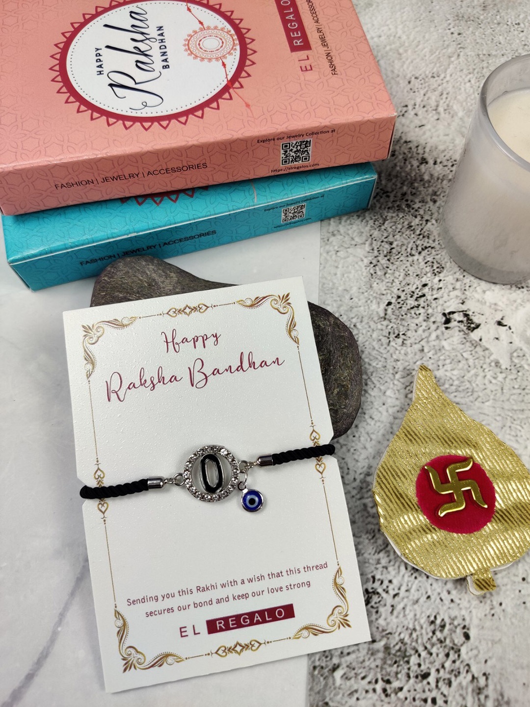 

EL REGALO O Name Initial Evil Eye Rakhi, Black