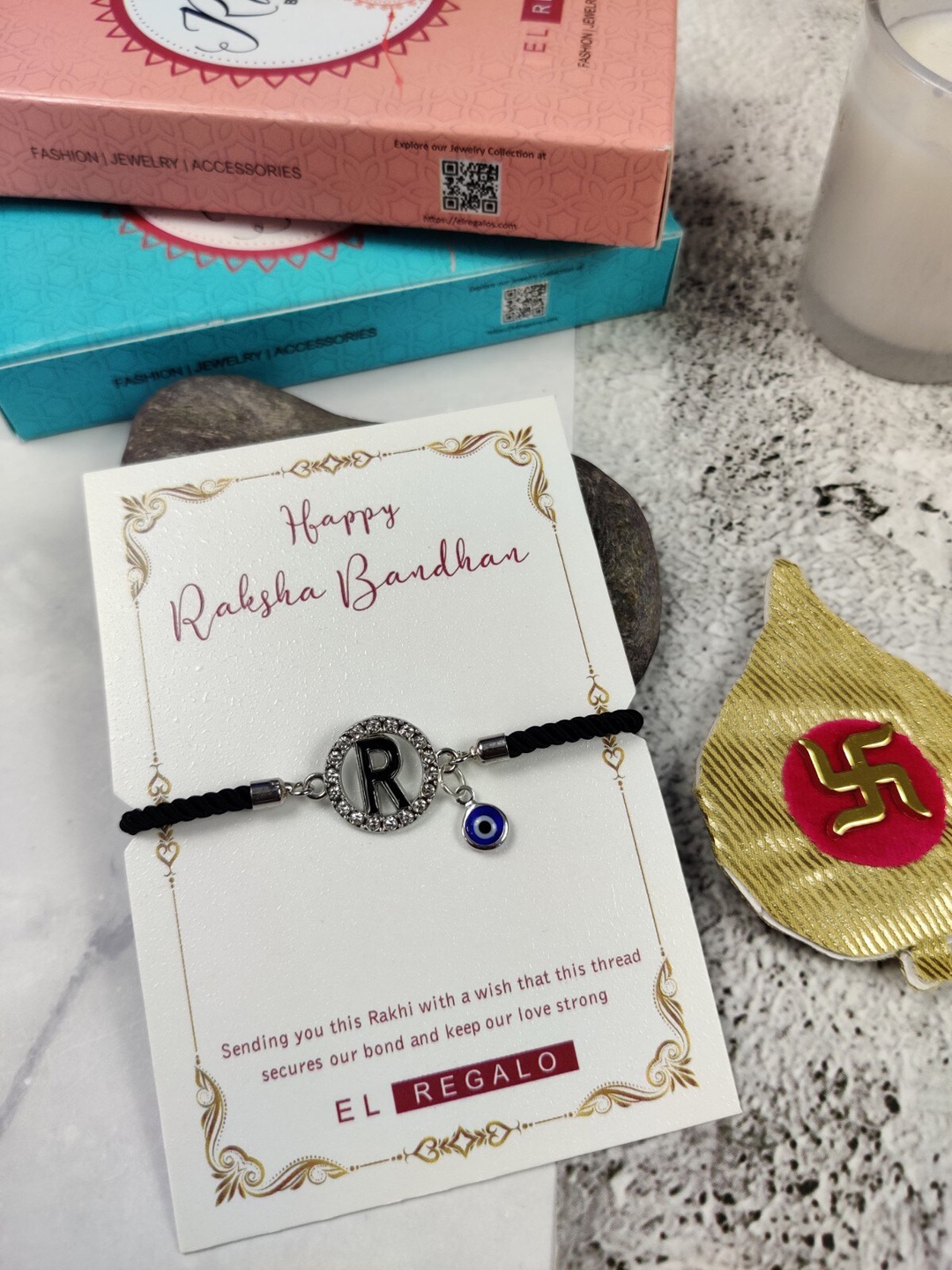 

EL REGALO R Name Initial Evil Eye Rakhi Card, Black