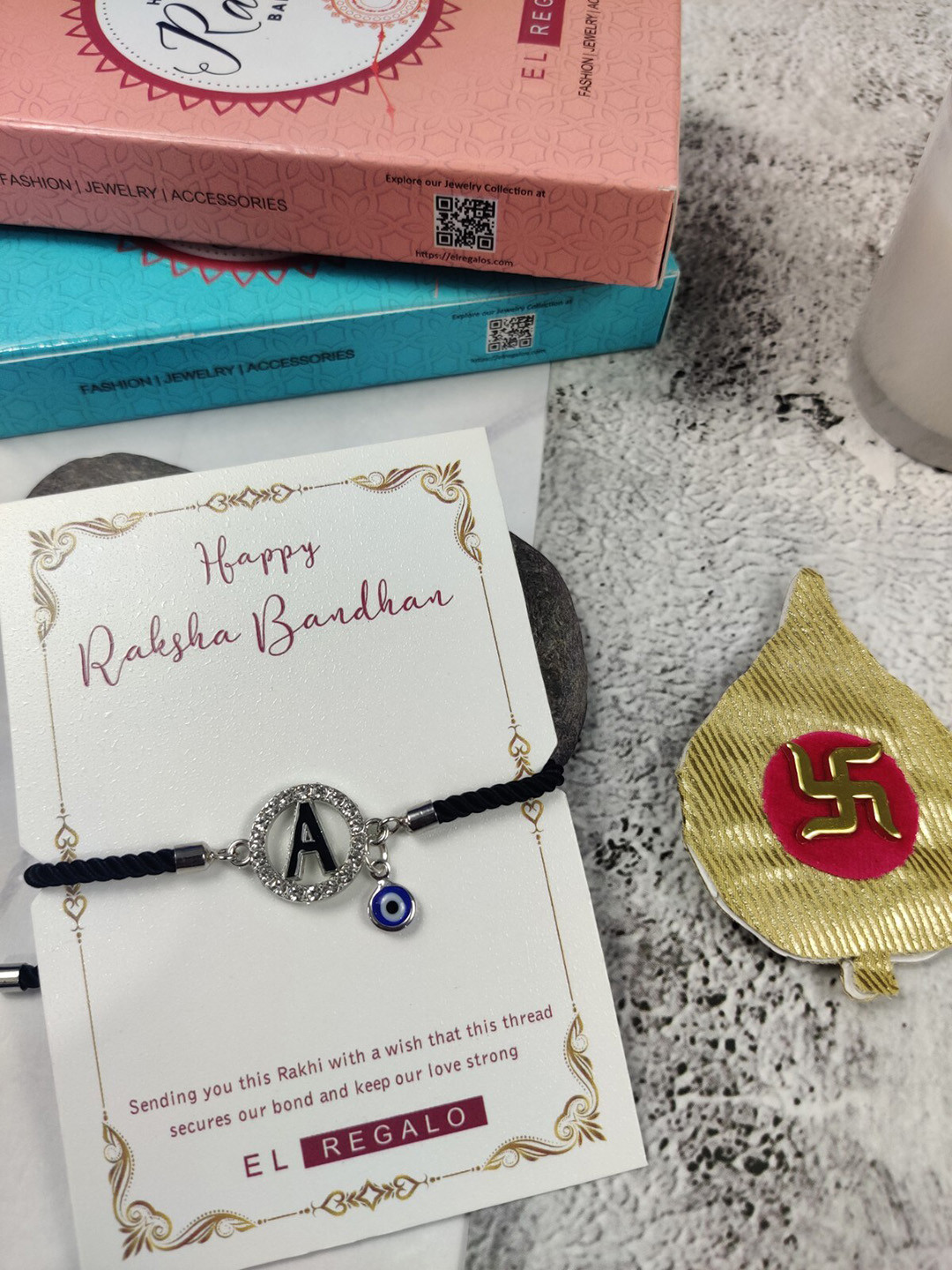 

EL REGALO A Name Initial Evil Eye Rakhi Card, Black