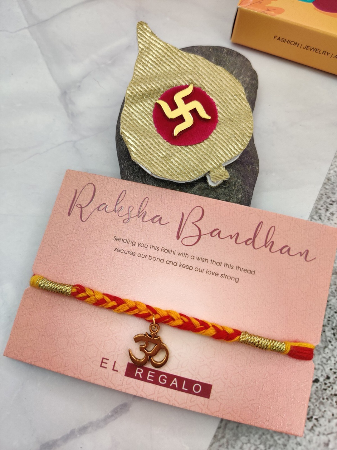 

EL REGALO Om Charm Thread Rakhi & Greeting Card, Gold