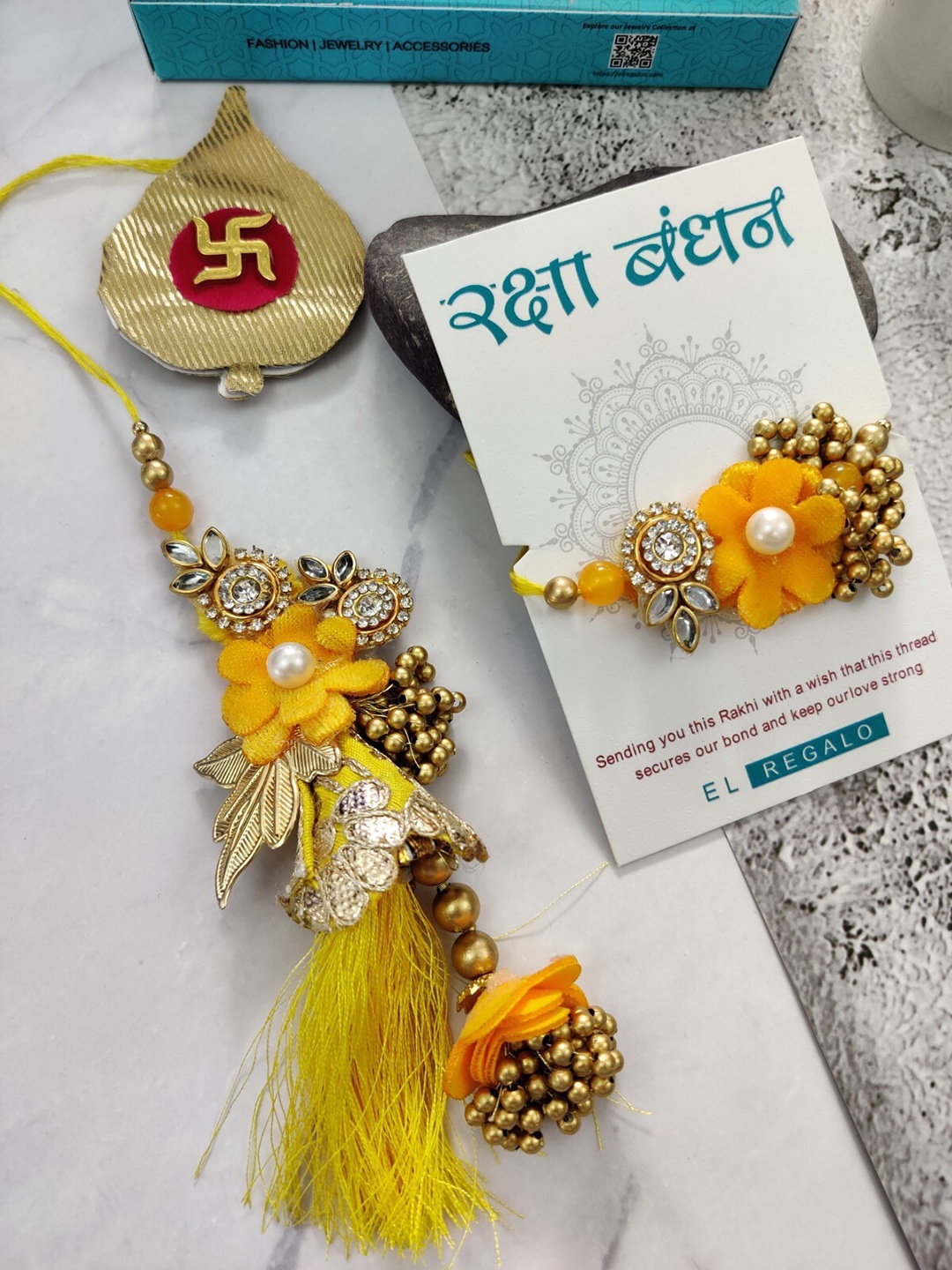 

EL REGALO Men Set Of 2 Yellow & Gold Stone-Studded And Beaded Rakhi With Greeting Card