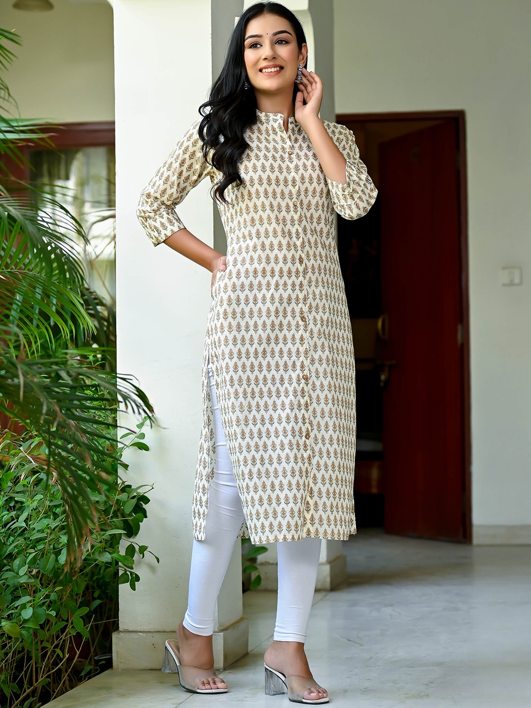 

Nishika Ethnic Motifs Printed Mandarin Collar Cotton Kurta, Yellow