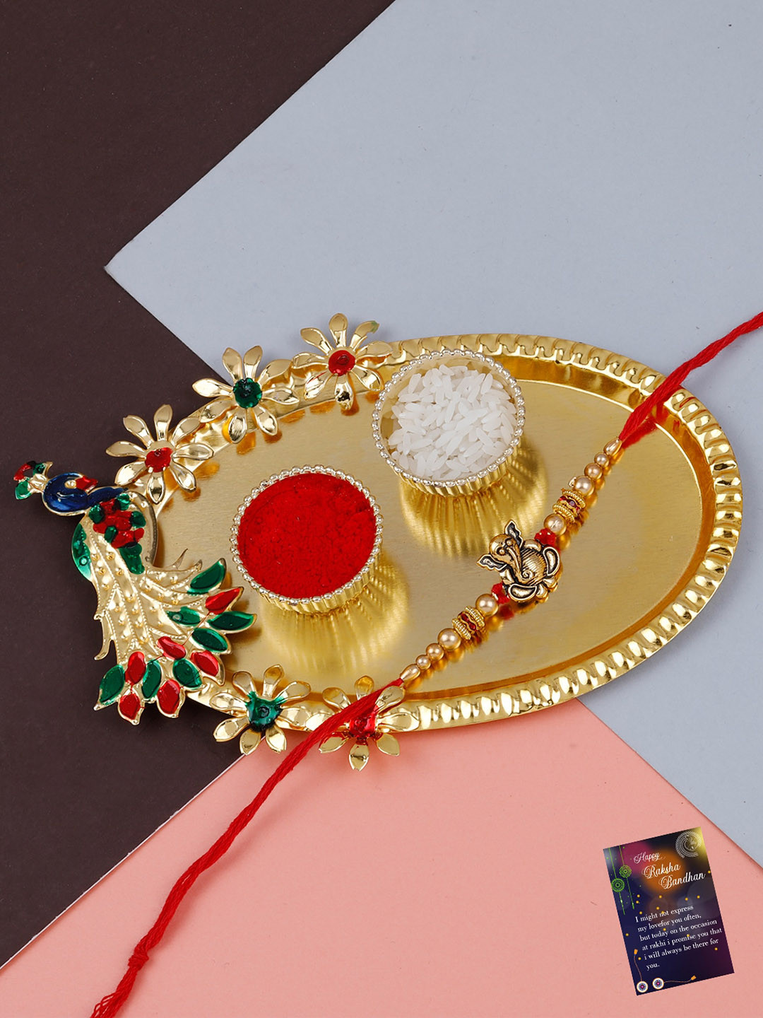 

Silver Shine Ganesh Charm Rakhi With Roli Chawal & Pooja Thali, Red