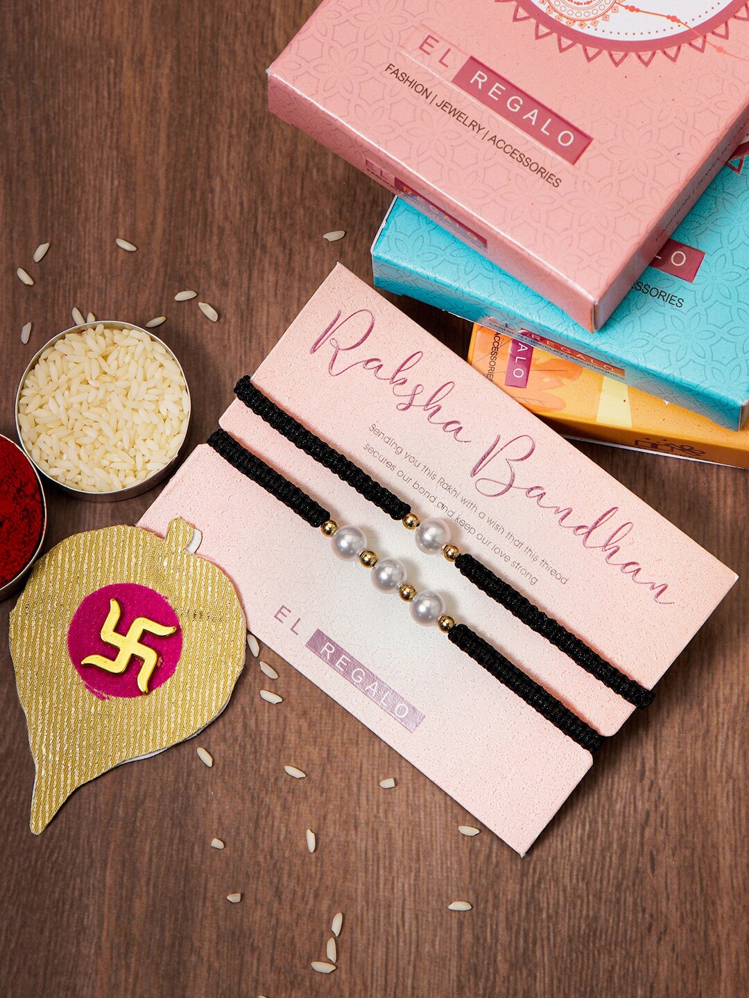 

EL REGALO Set Of 2 Pearl Rakhi Combo for Bhaiya and Bhabhi With Roli Rice, Black