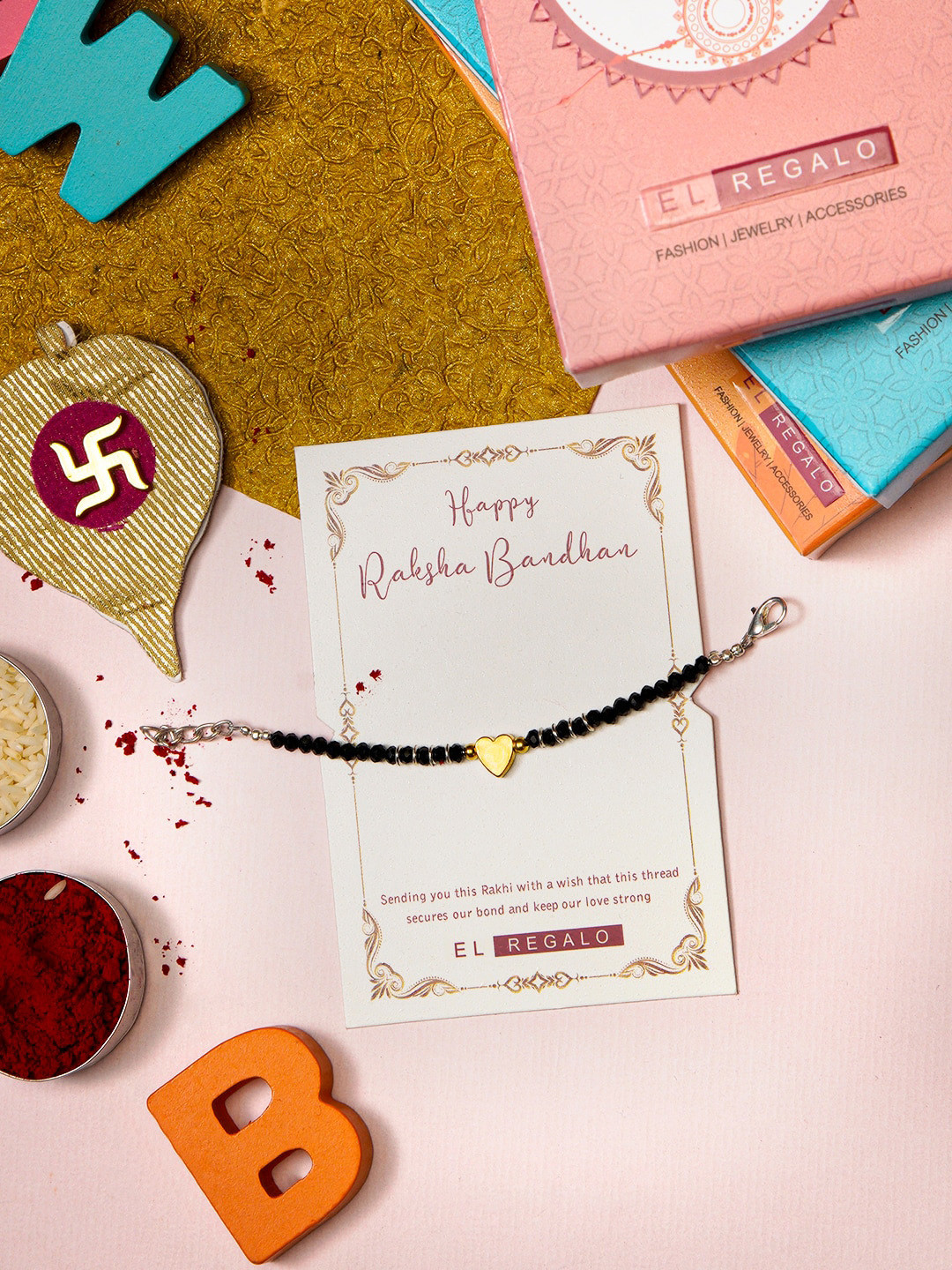 

EL REGALO Nazaria Charm Rakhi for Baby and Infants With Roli Chawal Rakhi Card, Black