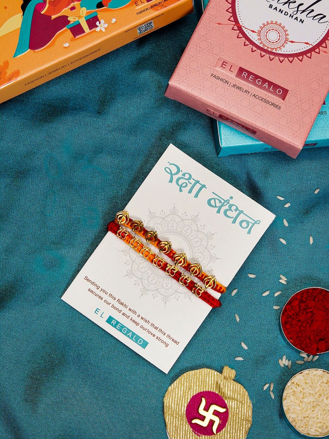 

EL REGALO Set Of 2 Bhaiya & Bhabhi Rakhi With Roli Chawal, Red