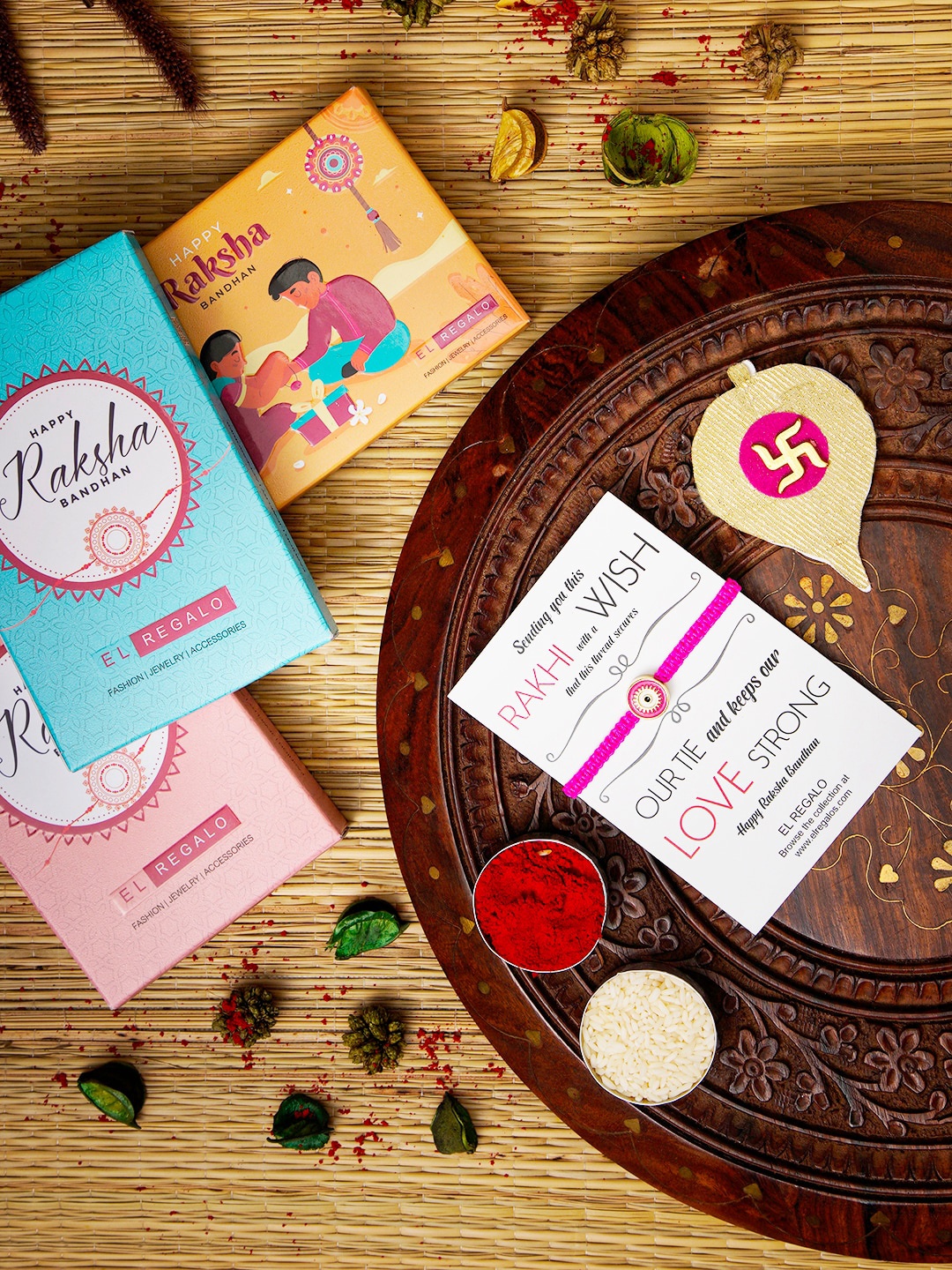 

EL REGALO Evil Eye Name Initial Rakhi With Roli chawal Card, Pink
