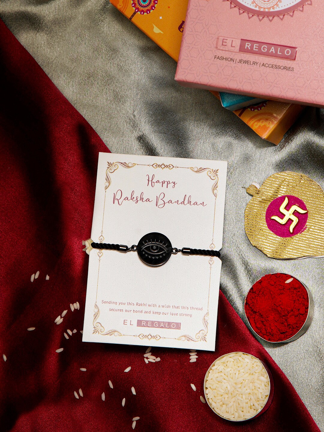 

EL REGALO Evil Eye Name Initial Stainless Steel Rust Free Rakhi With Roli chawal Card, Black