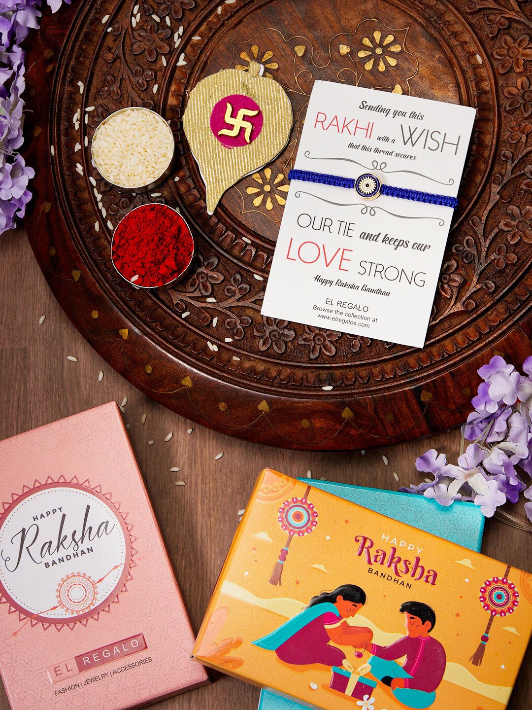

EL REGALO Evil Eye Name Initial Rakhi With Roli chawal Card, Blue