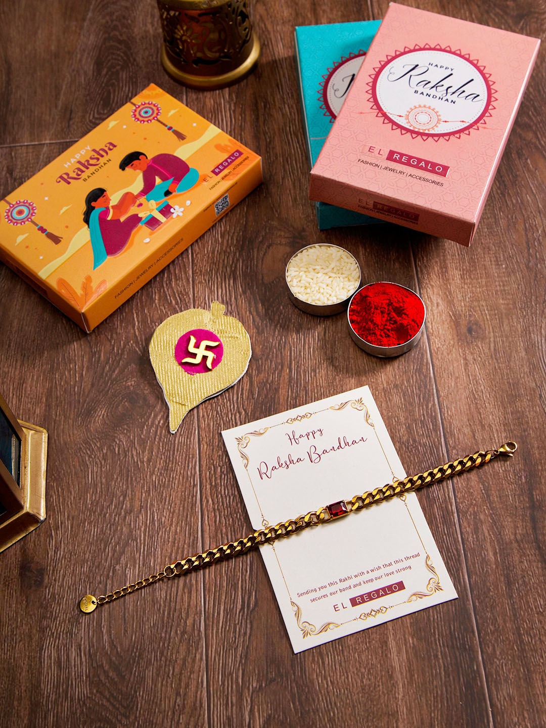 

EL REGALO Charm Stainless Steel Rust Free Rakhi With Roli Chawal & Greeting Card, Gold