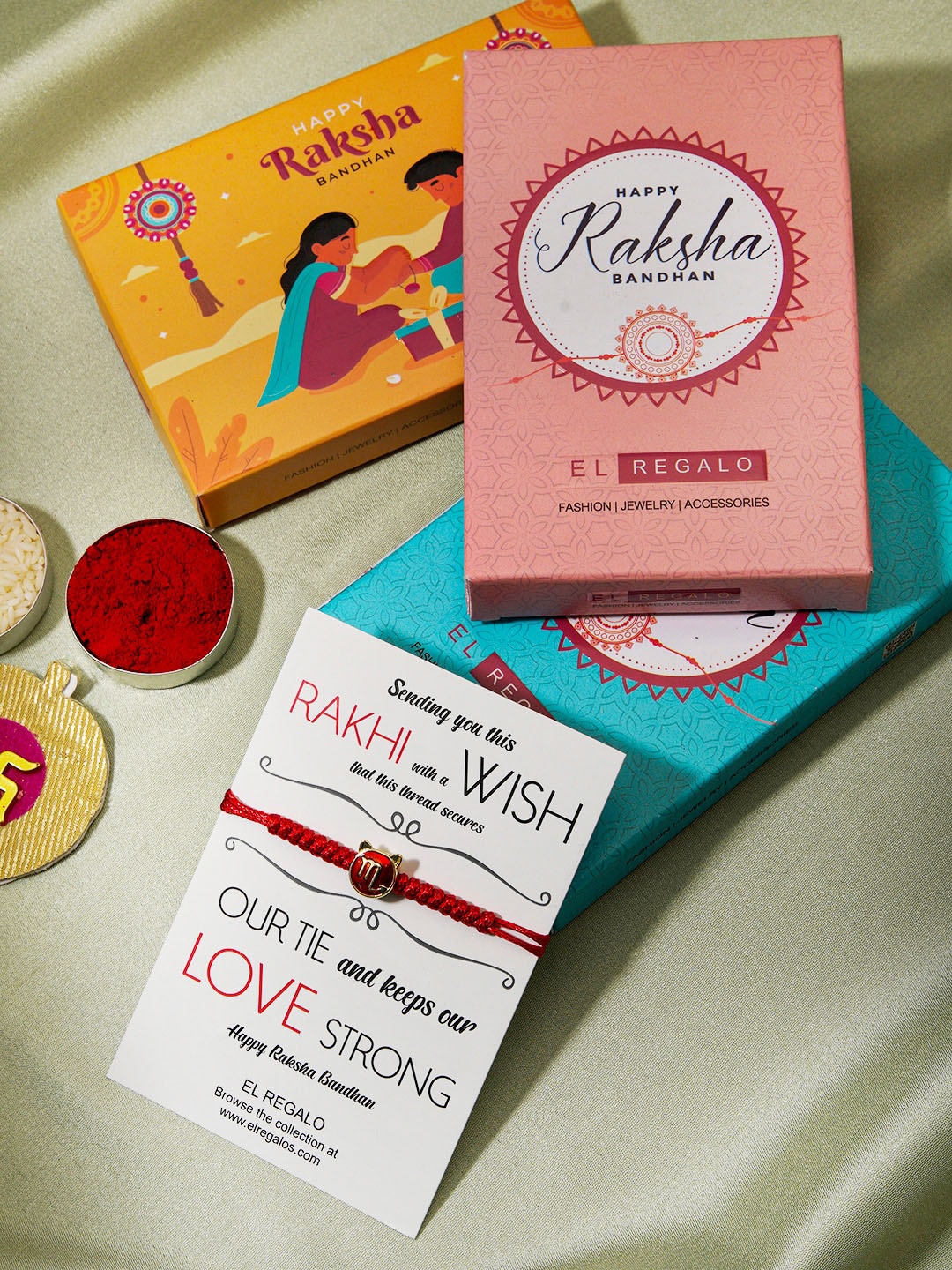 

EL REGALO Zodiac Sign Detail Rakhi With Roli Rice & Greeting Card, Red