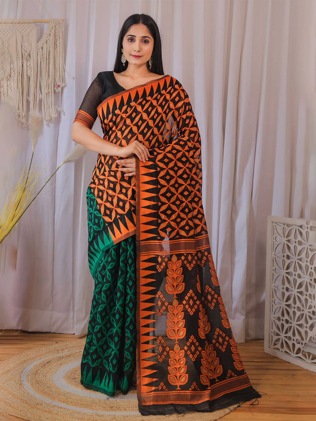 

Mitera Orange & Green Ethnic Woven Design Silk Cotton Jamdani Saree