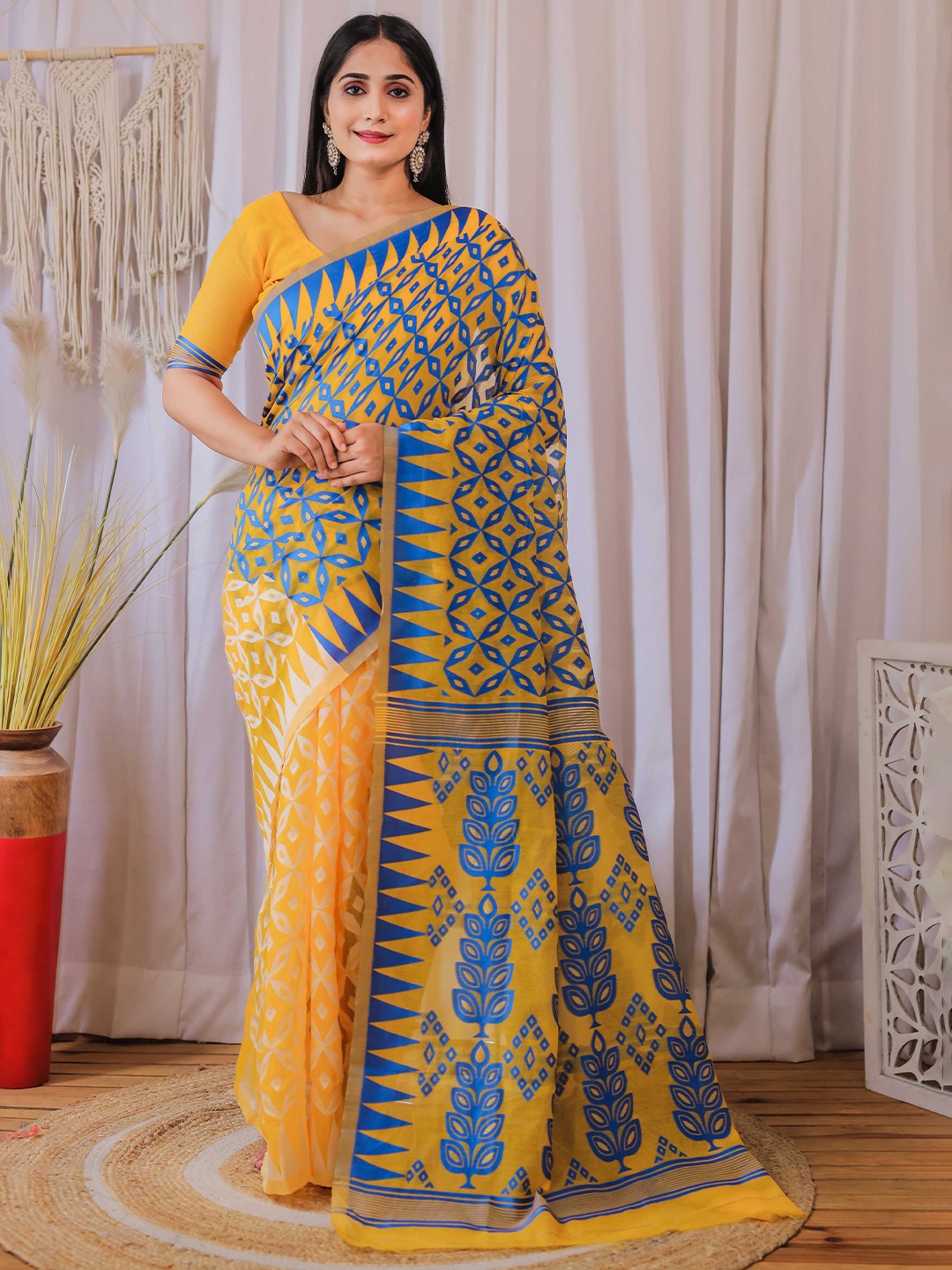 

Mitera Yellow & Blue Ethnic Woven Design Silk Cotton Jamdani Saree