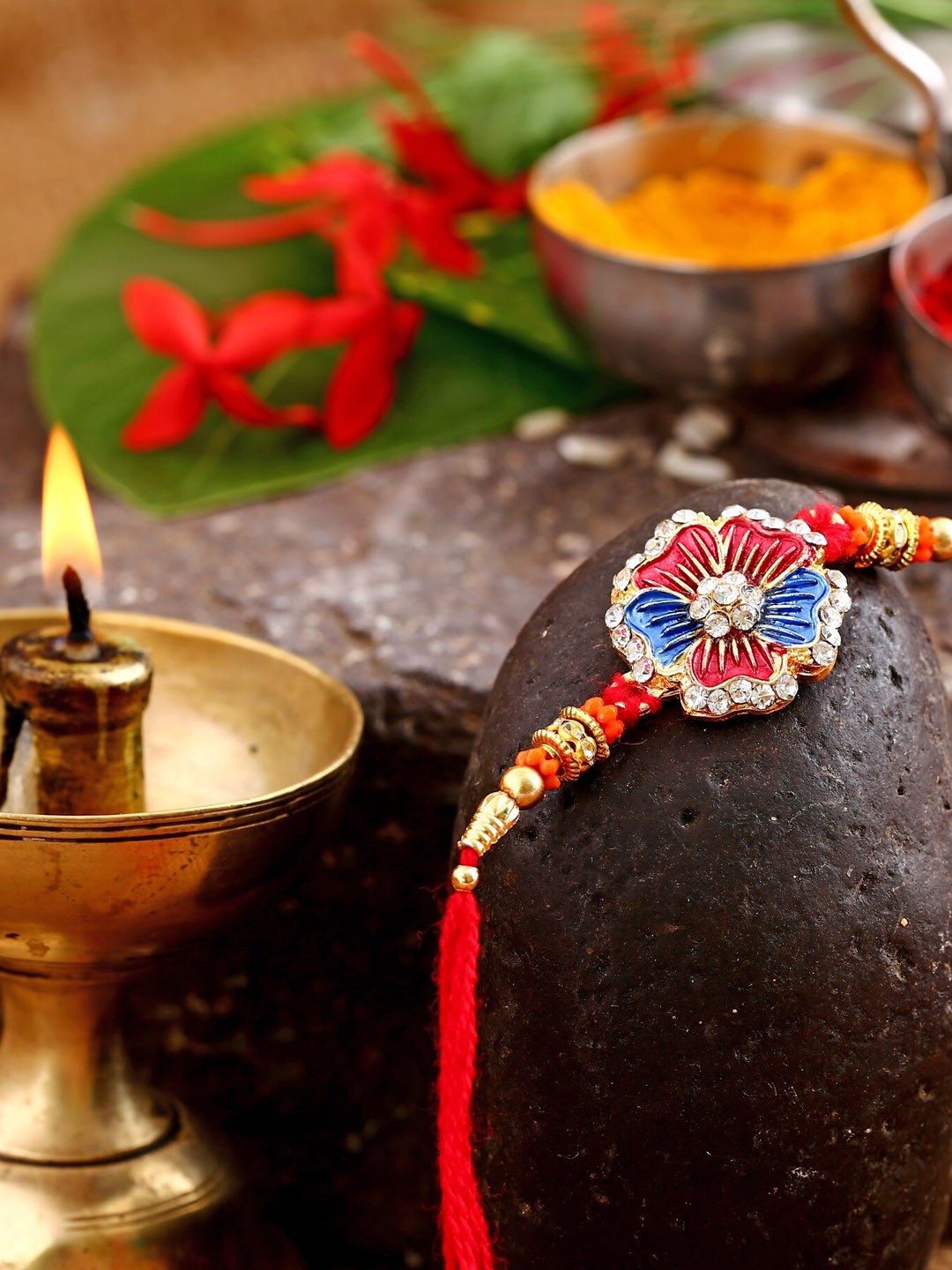 

Vighnaharta Boys Gold-Plated Floral Design Charm Thread Rakhi