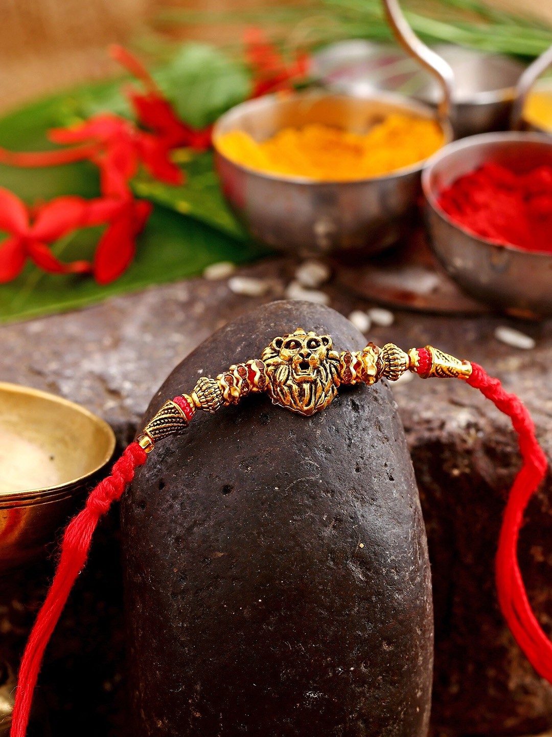 

Vighnaharta Boys Gold-Plated Rakhi With Kumkum Leaf Set