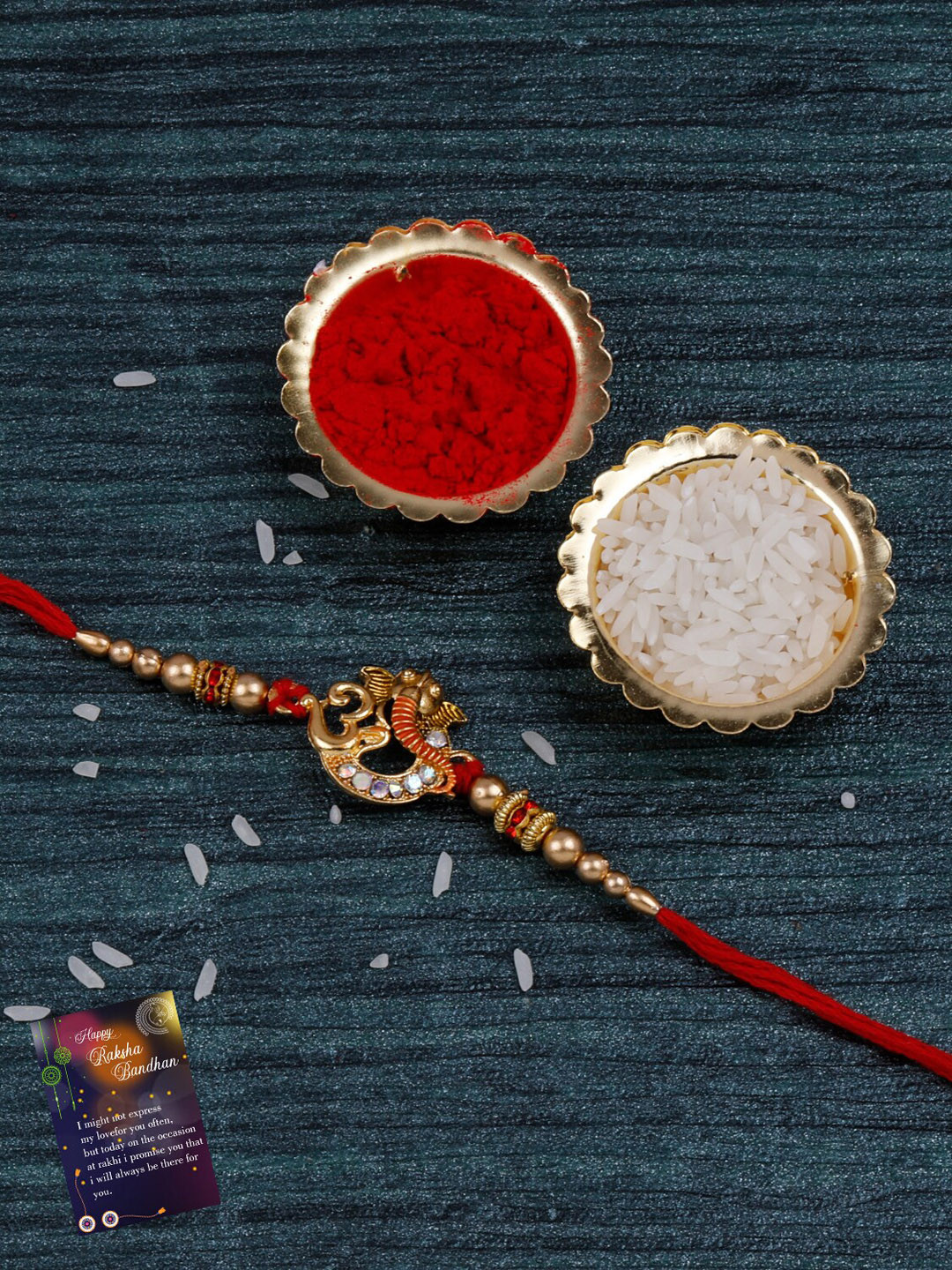 

Silver Shine Unisex Stone-Studded Ganesh & Om Rakhi With Roli & Chawal & Greeting Card, Red