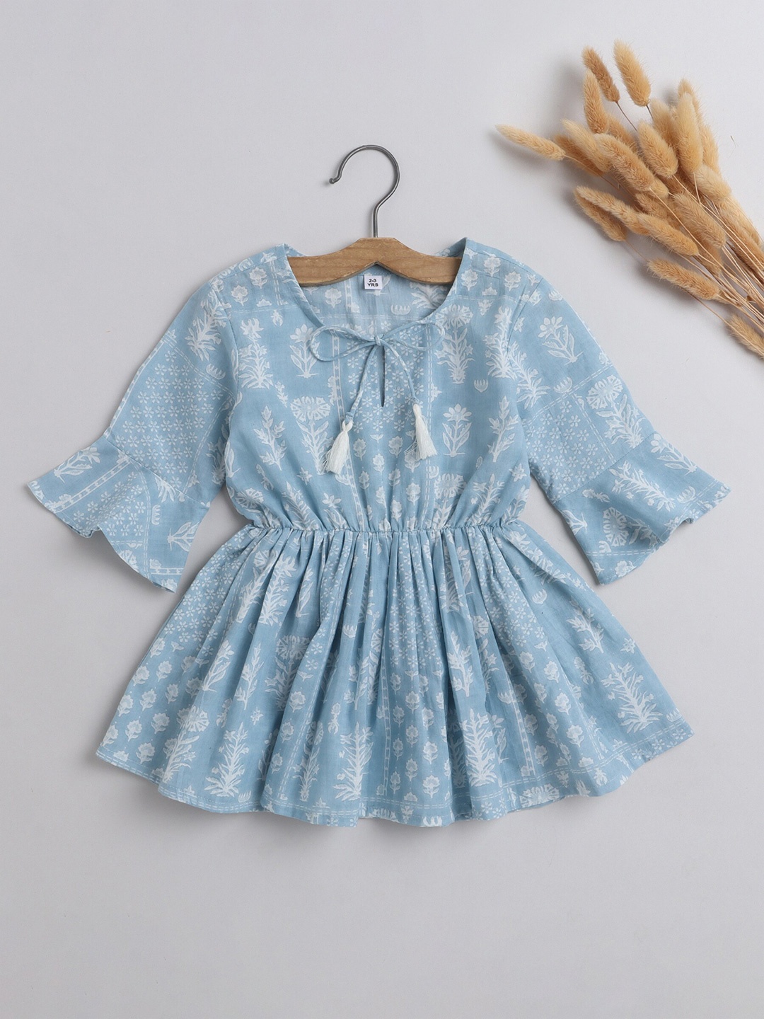 

The Magic Wand Girls Floral Printed Tie-Up Neck Bell Sleeve Pure Cotton Cinched Waist Top, Blue