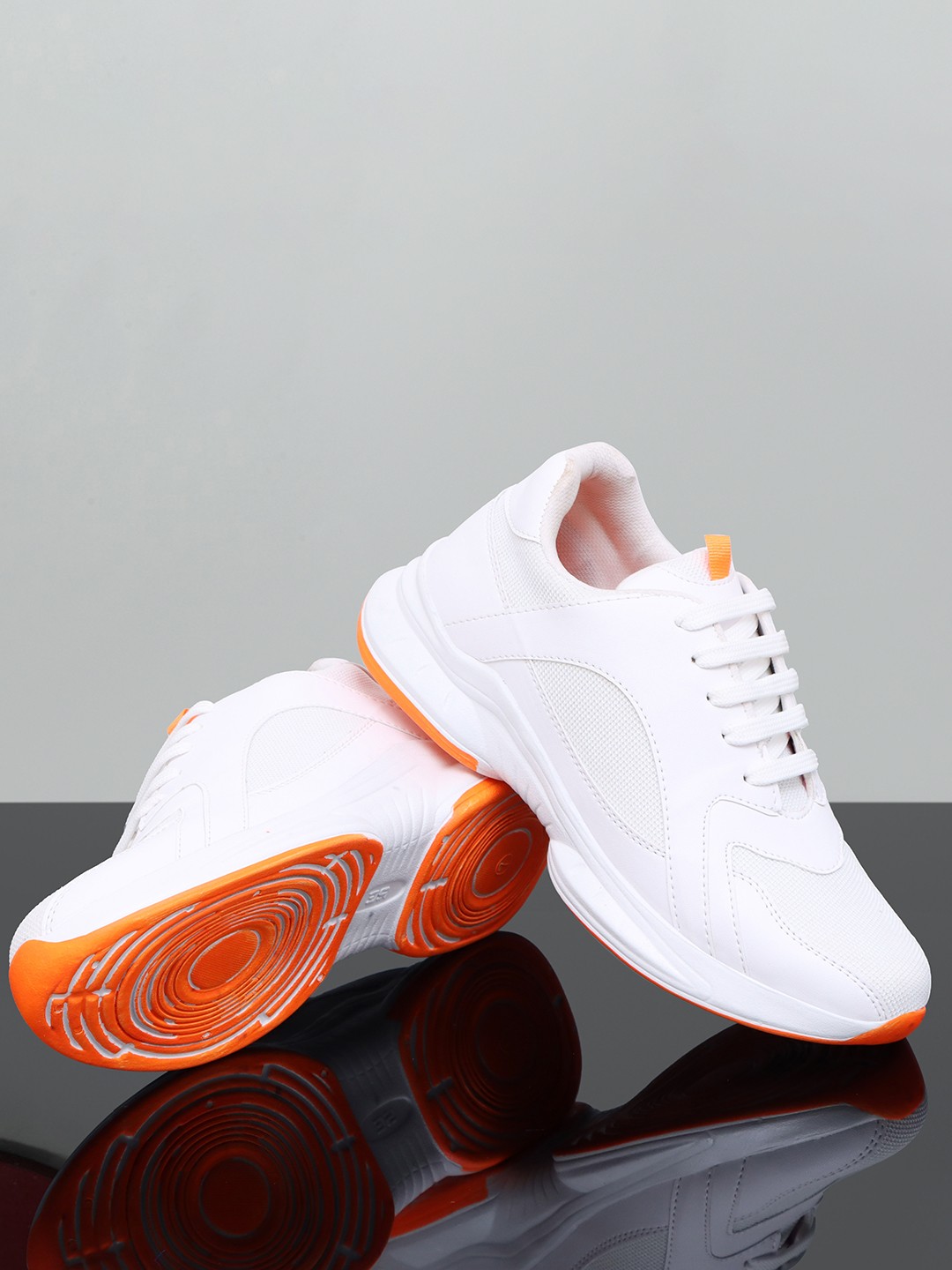 

Roadster Men White & Orange Textured Lightweight Padded Insole Contrast Sole Sneakers