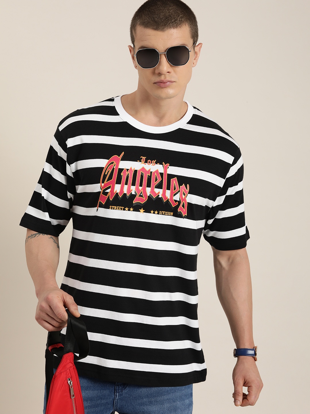 

Difference of Opinion Men Typography Printed Monochrome Pure Cotton T-shirt, Black