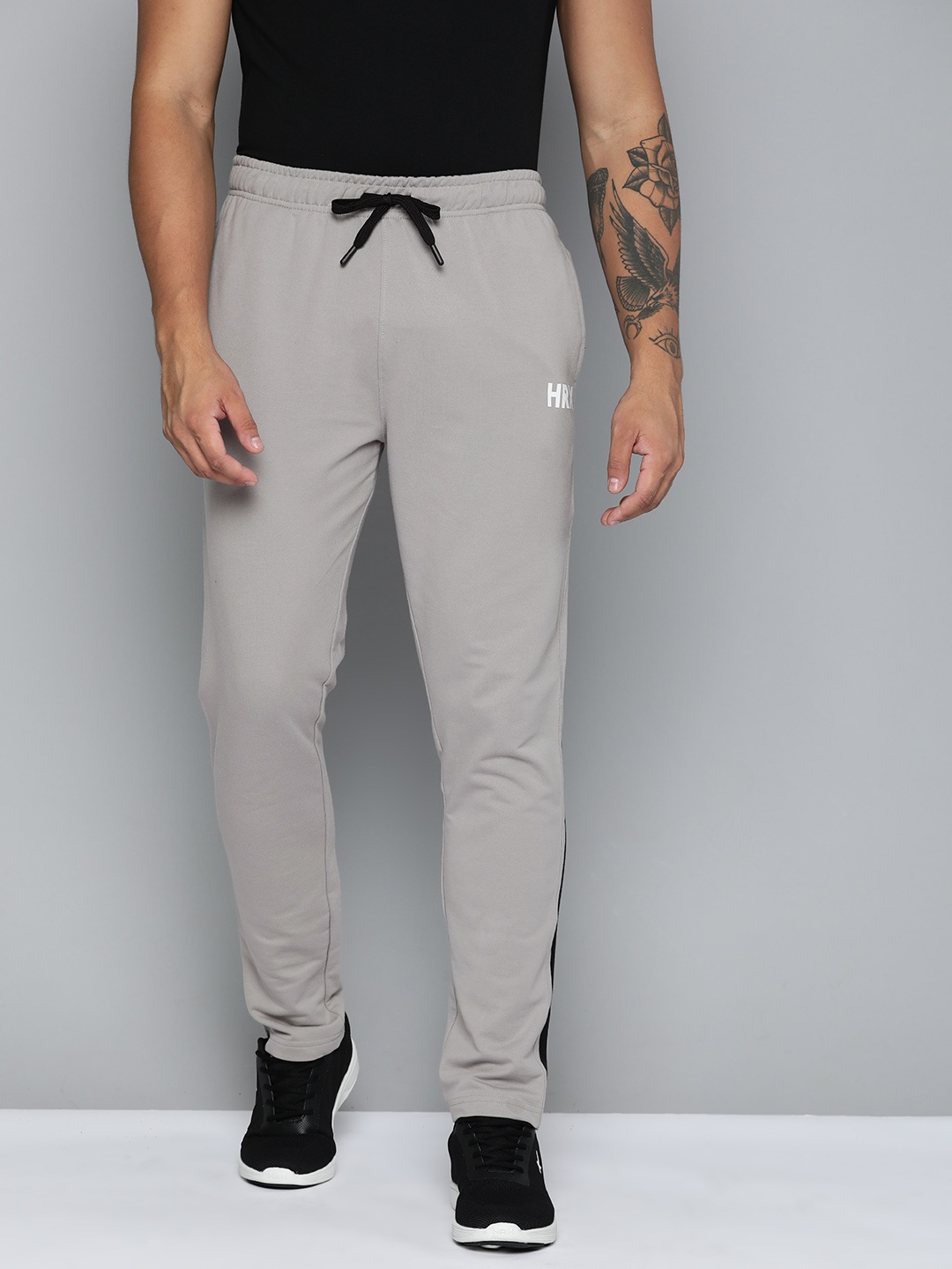 

HRX by Hrithik Roshan Men Striped Regular Fit Track Pants, Grey