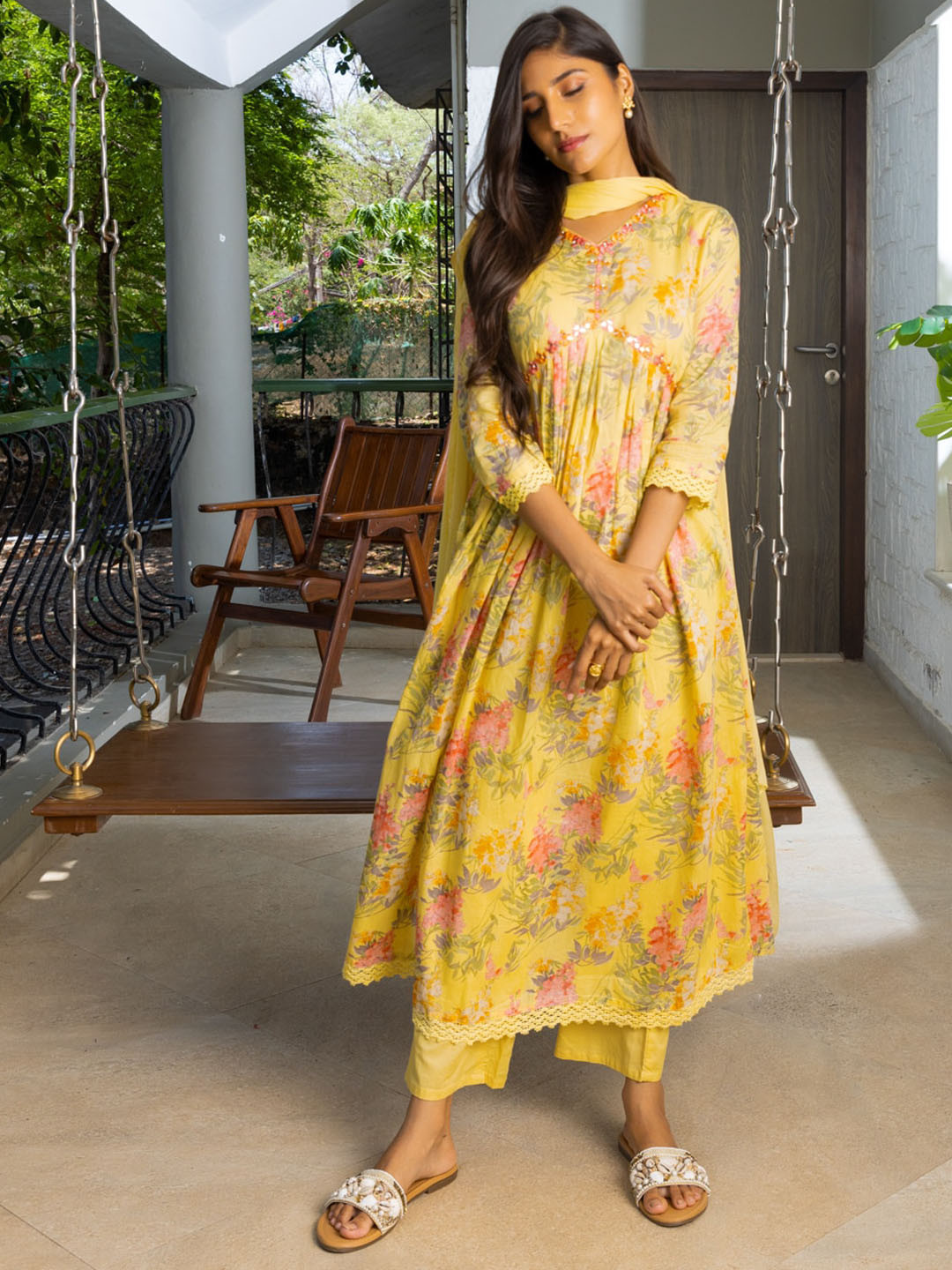 

Ishin Yellow Floral Printed Mirrior Work Anarkali Kurta & Palazzos With Dupatta