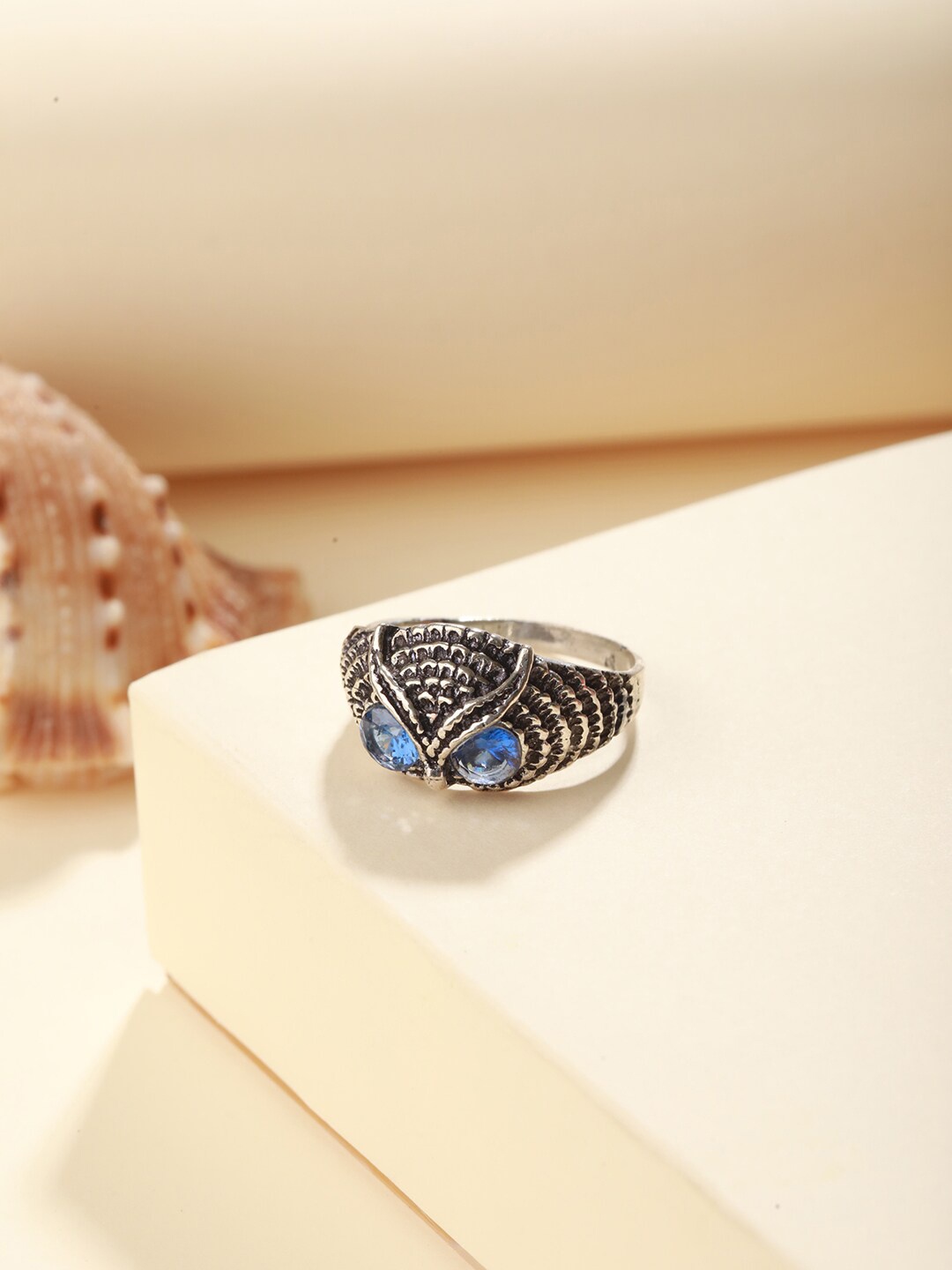 

Priyaasi Silver-Plated Stone-Studded Owl Eye Shaped Finger Ring