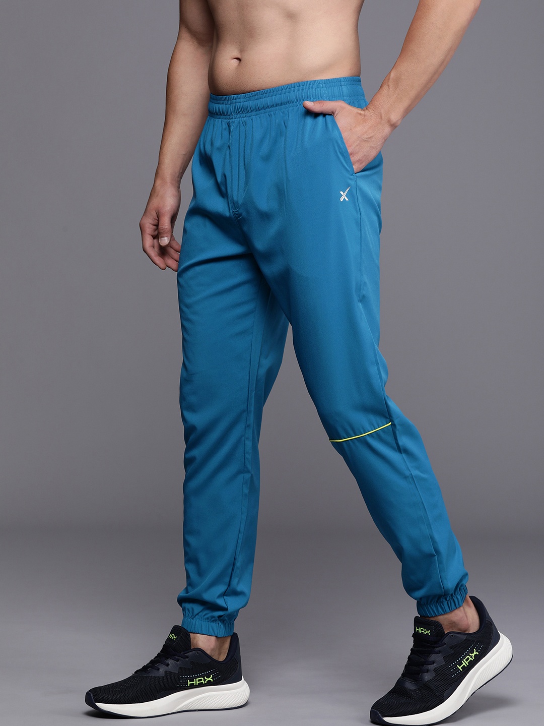 

HRX by Hrithik Roshan Men Solid Mid-Rise Rapid-Dry Training Joggers, Blue