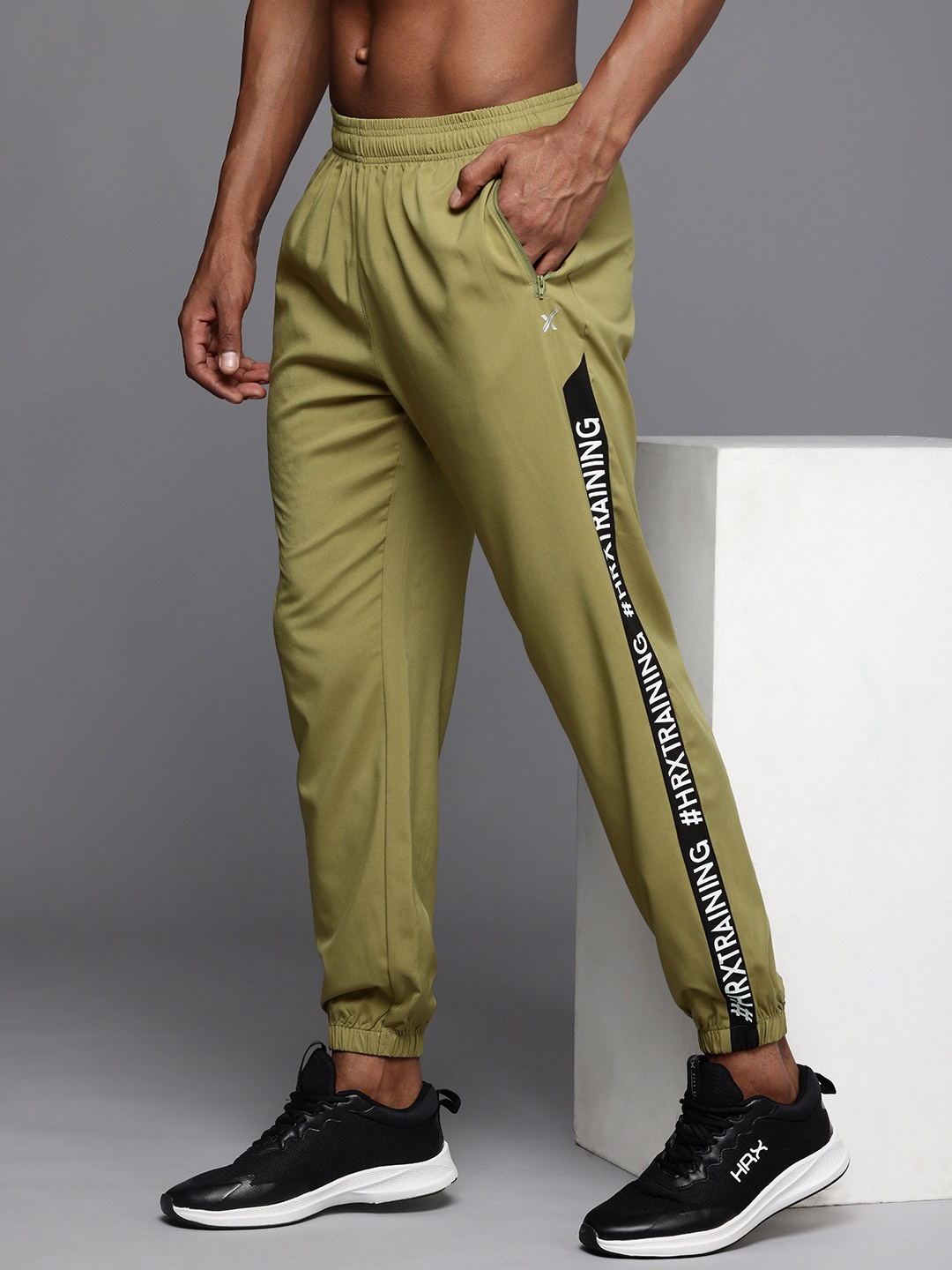 

HRX by Hrithik Roshan Men Solid Rapid-Dry Antimicrobial Training Joggers Track Pants, Olive
