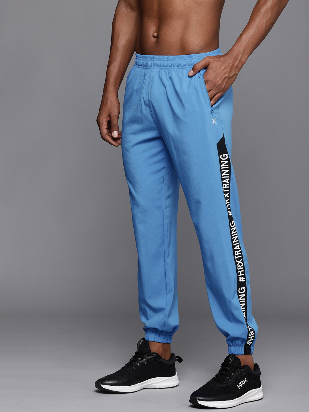 

HRX by Hrithik Roshan Men Solid Rapid-Dry Antimicrobial Training Joggers Track Pants, Blue