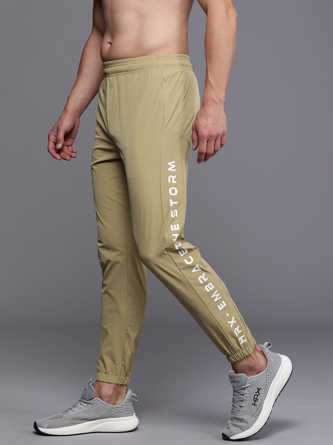 

HRX by Hrithik Roshan Men Typography Printed Mid-Rise Rapid-Dry Training Joggers, Beige