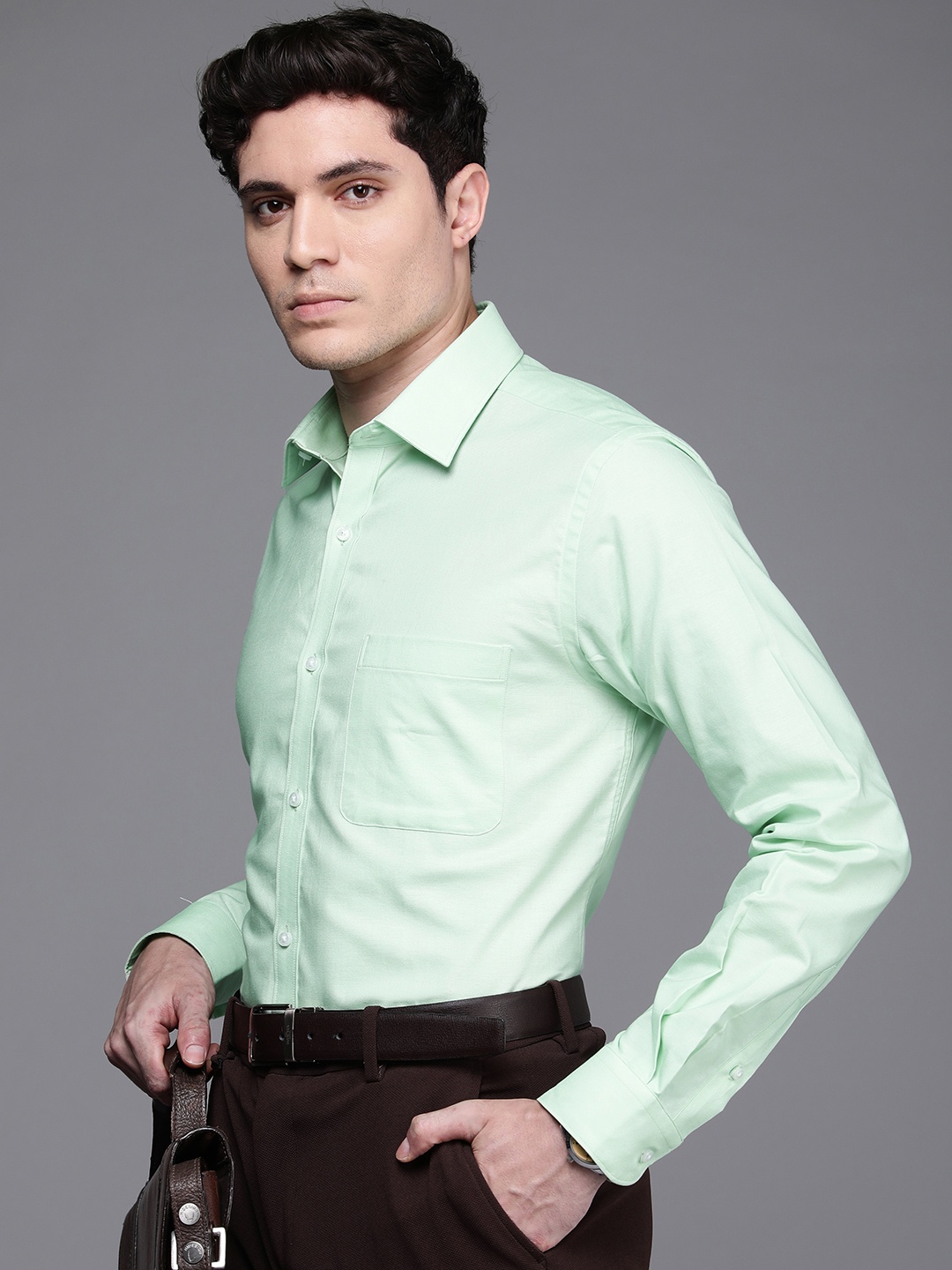 

Raymond Solid Slim Fit Pure Cotton Formal Shirt, Green