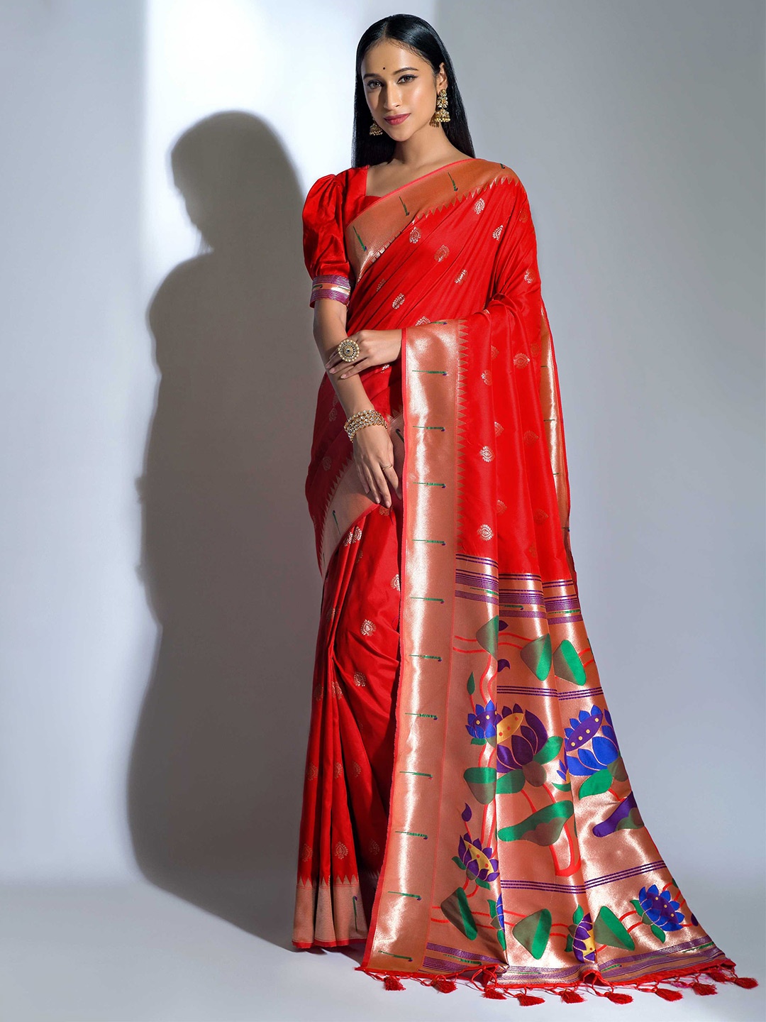

Mitera Red & Purple Ethnic Motifs Woven Design Zari Paithani Saree