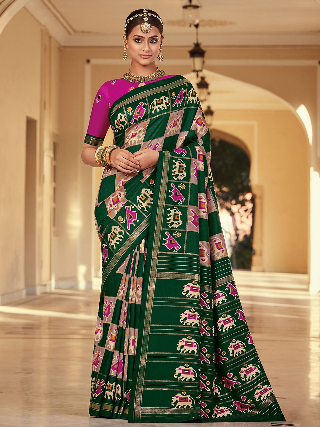 

Mitera Green & Pink Ethnic Motifs Printed Zari Saree