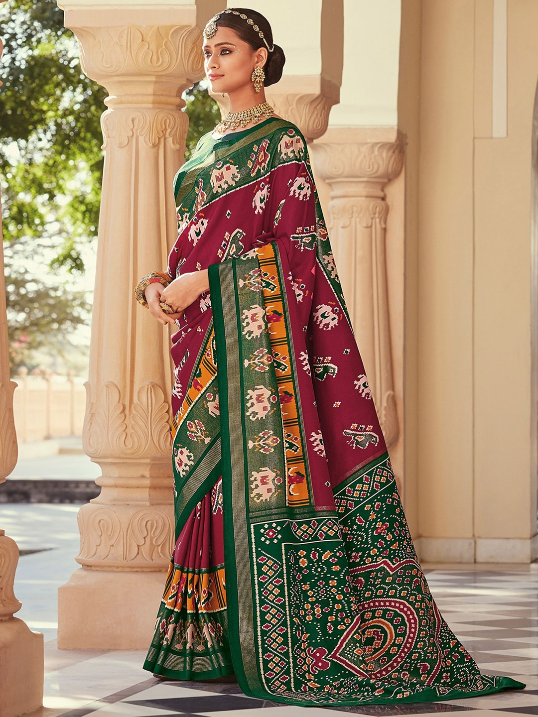 

Mitera Ethnic Motifs Printed Zari Saree, Maroon