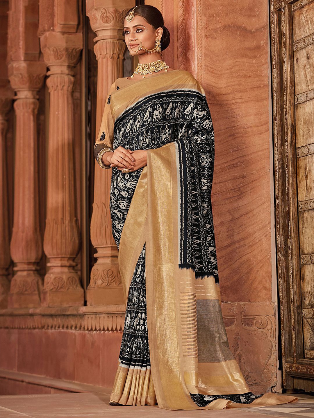 

Mitera Black & White Ethnic Motifs Printed Zari Saree
