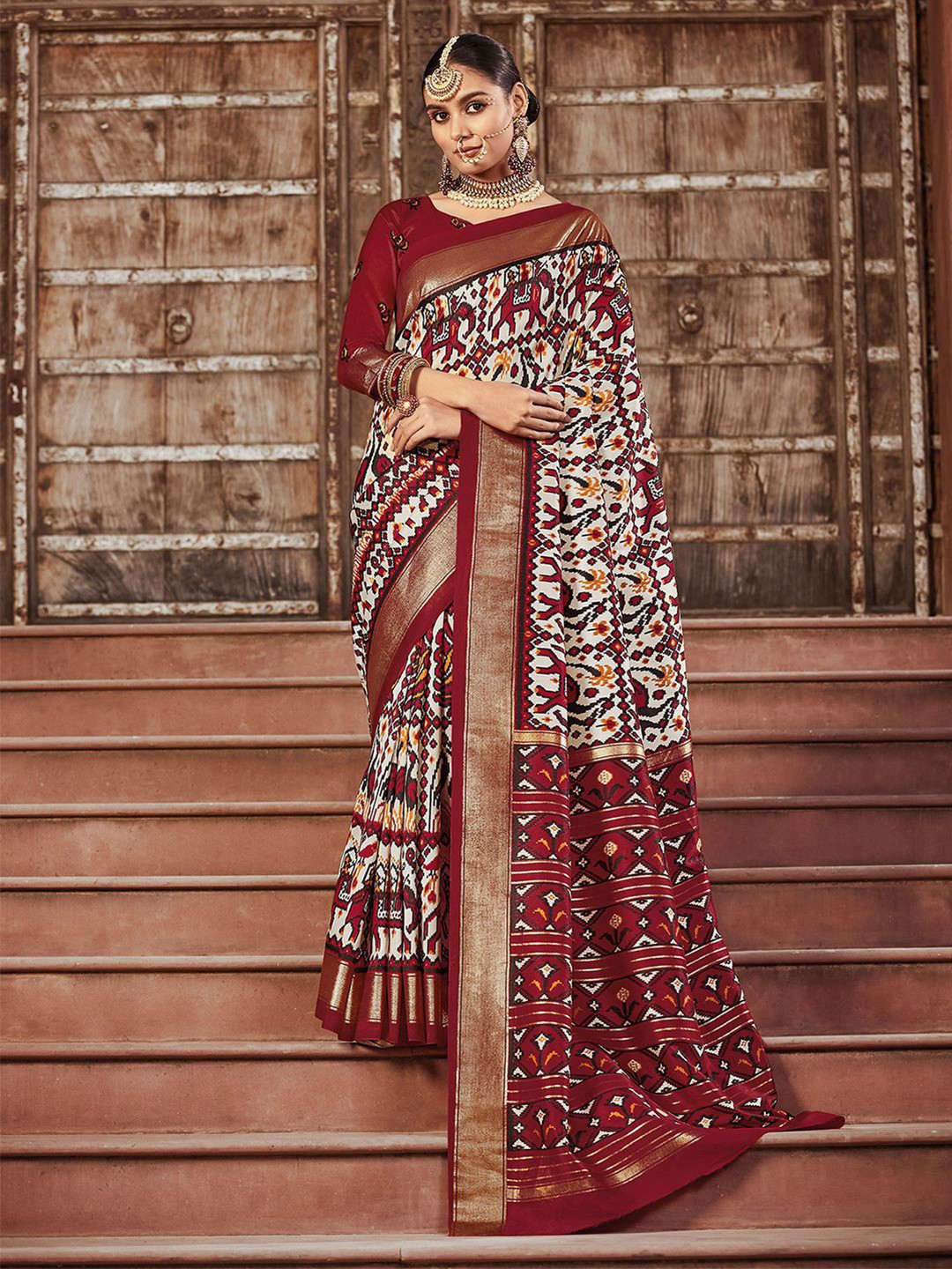 

Mitera Red & White Ethnic Motifs Printed Zari Saree