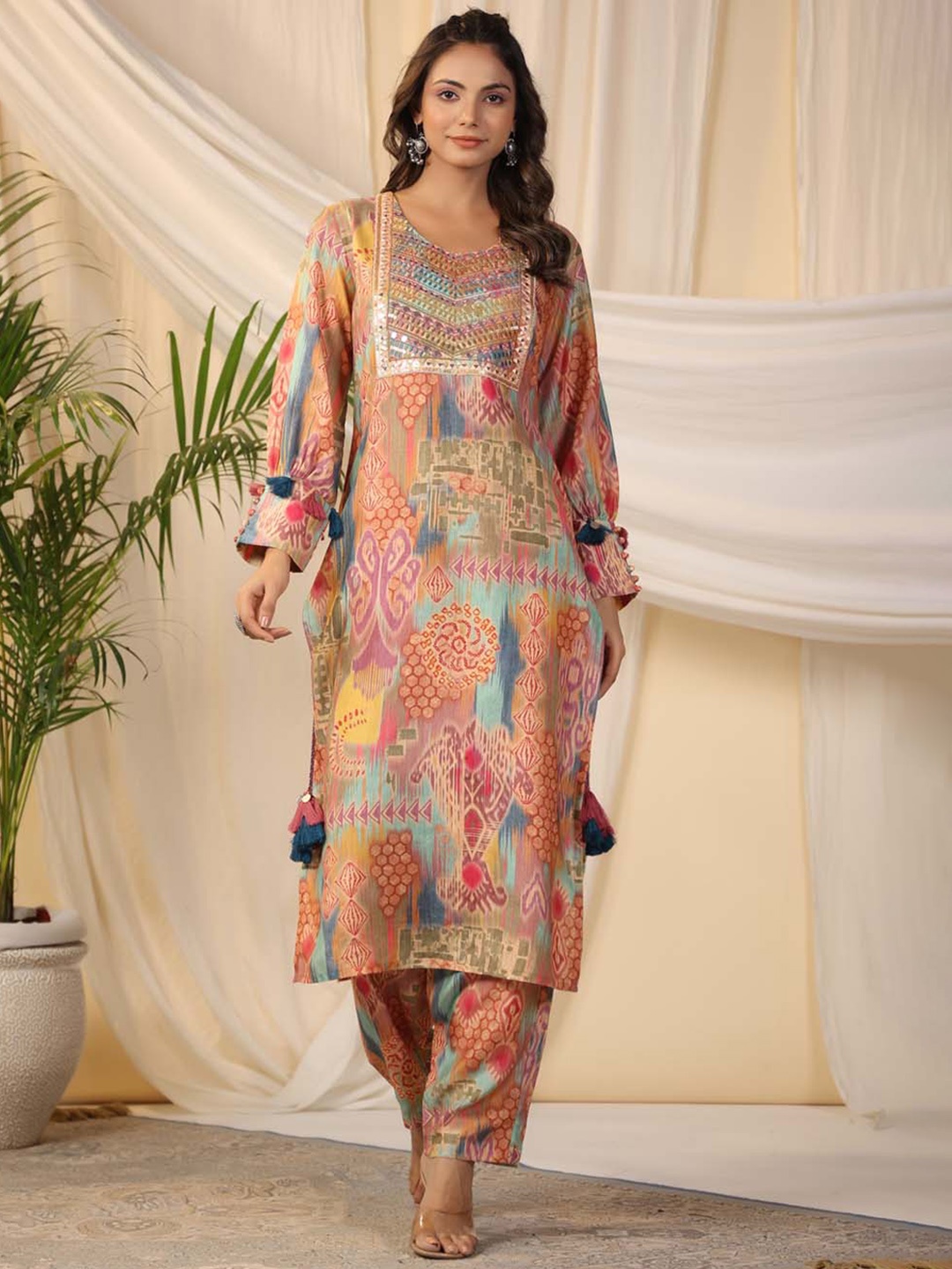 

Meena Bazaar Ethnic Motifs Printed Regular Sequinned Kurta With Trousers, Peach