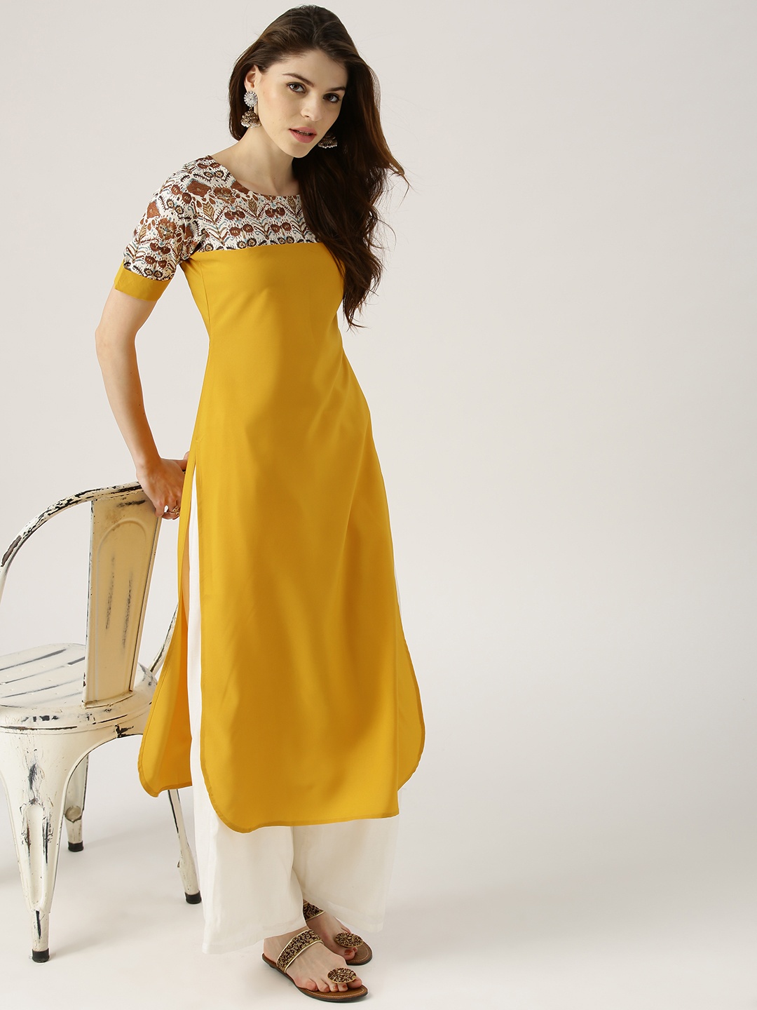 

Libas Women Mustard Yellow Solid Straight Kurta