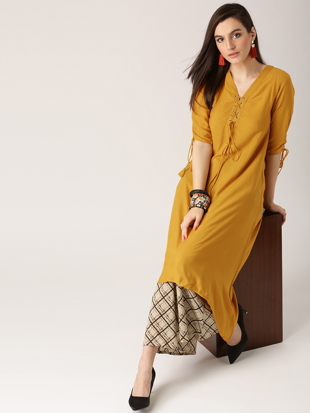 

Libas Women Mustard Yellow & Beige Solid Kurta with Printed Palazzos