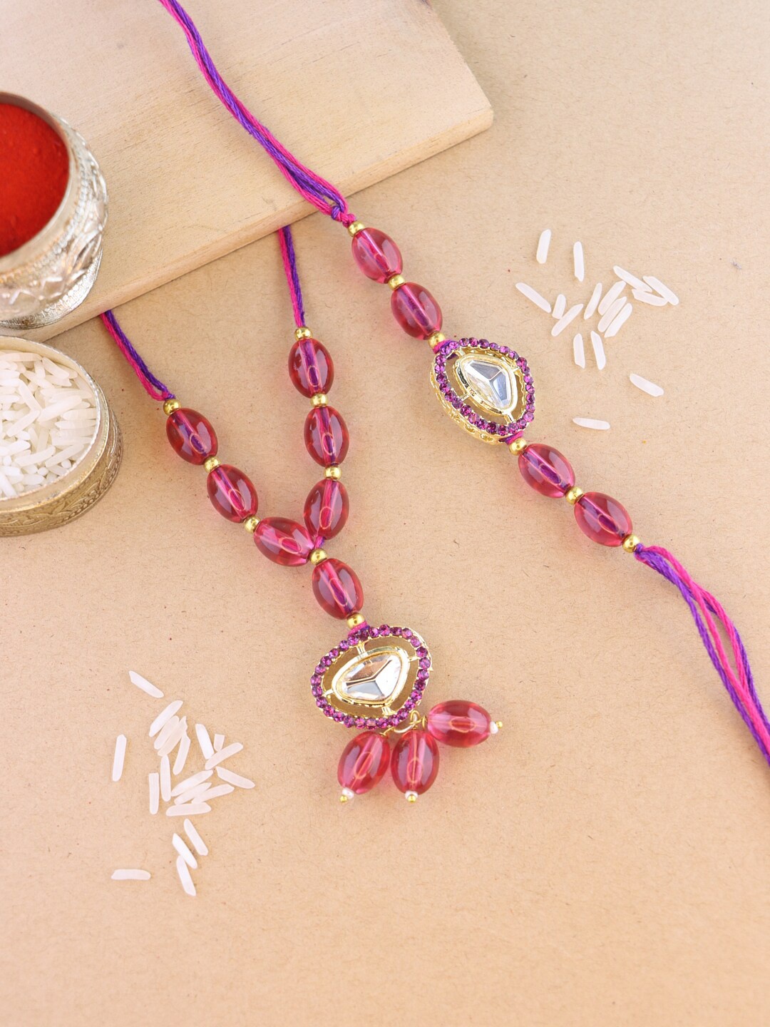 

I Jewels Bhaiya Bhabhi Rakhi Set with Roli Chawal & Card, Pink