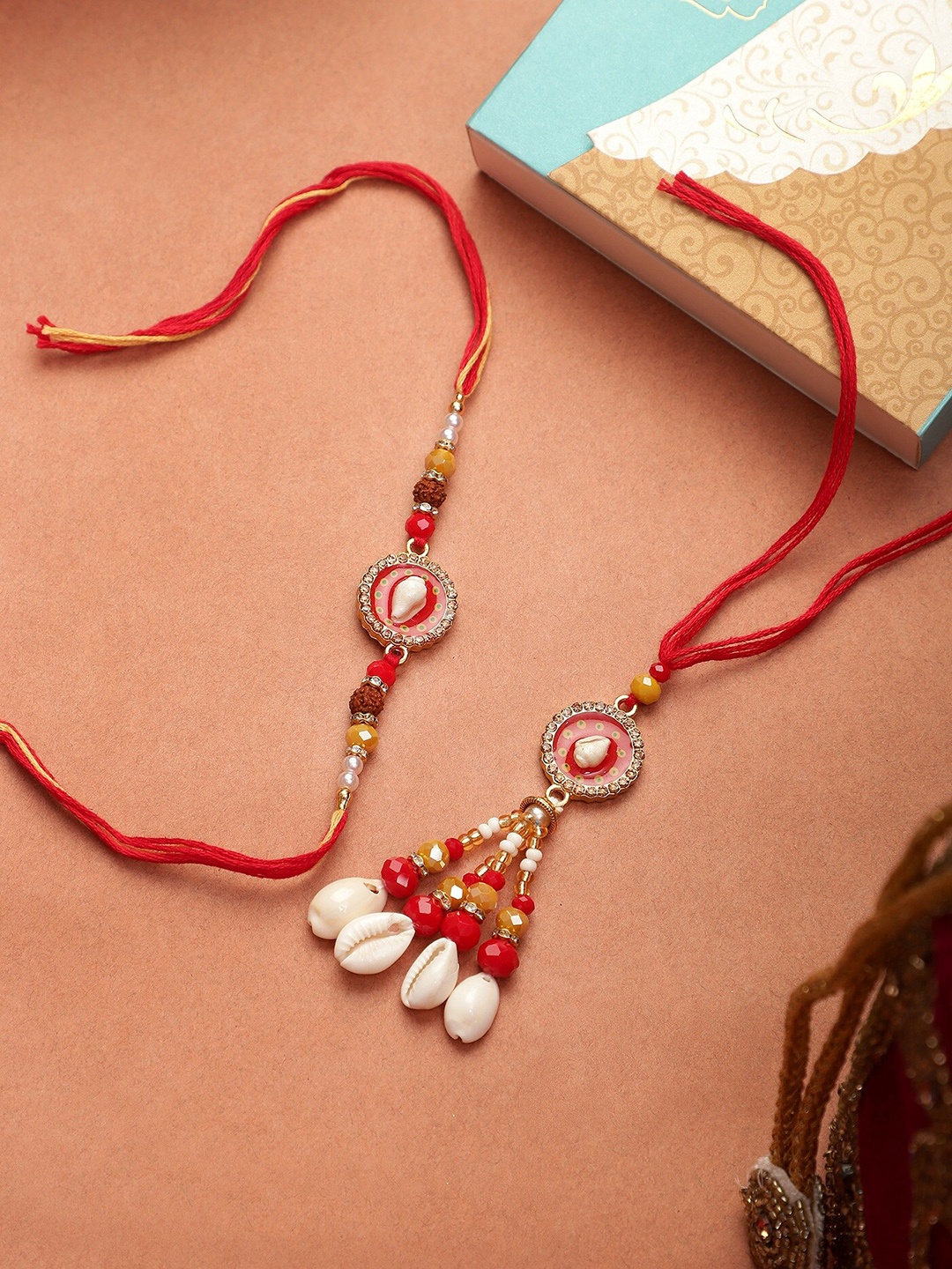 

Mali Fionna Set Of 2 Stone-Studded & Beaded Rakhis, Red