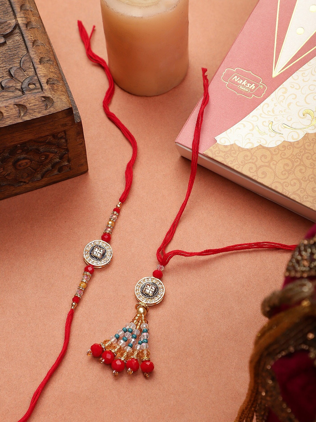 

Mali Fionna Unisex Set Of 2 Stone-Studded & Beaded Rakhis, Red