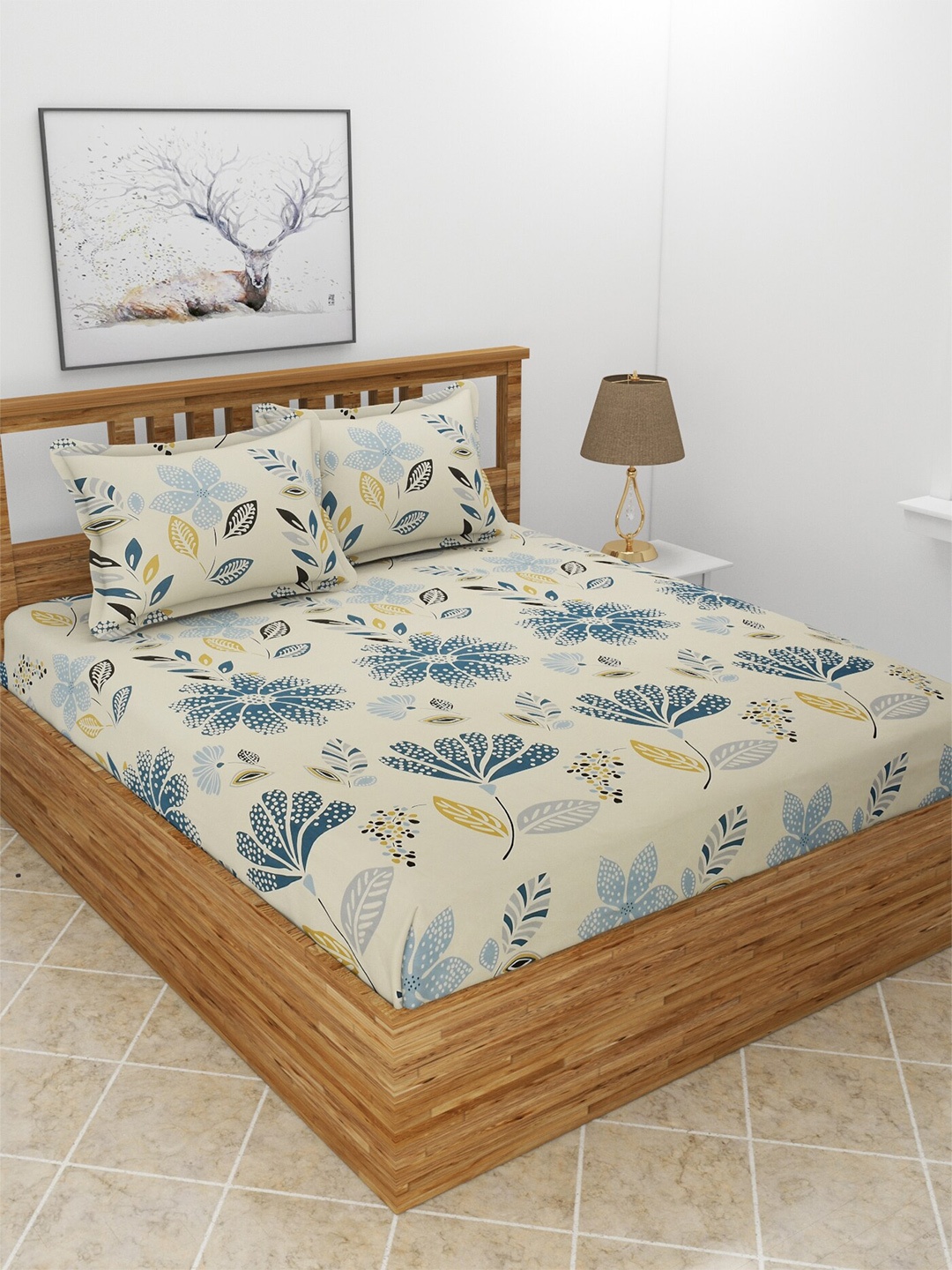 

MORADO Safron Cream-Coloured & Blue Printed 210 TC King Bedsheet With 2 Pillow Covers