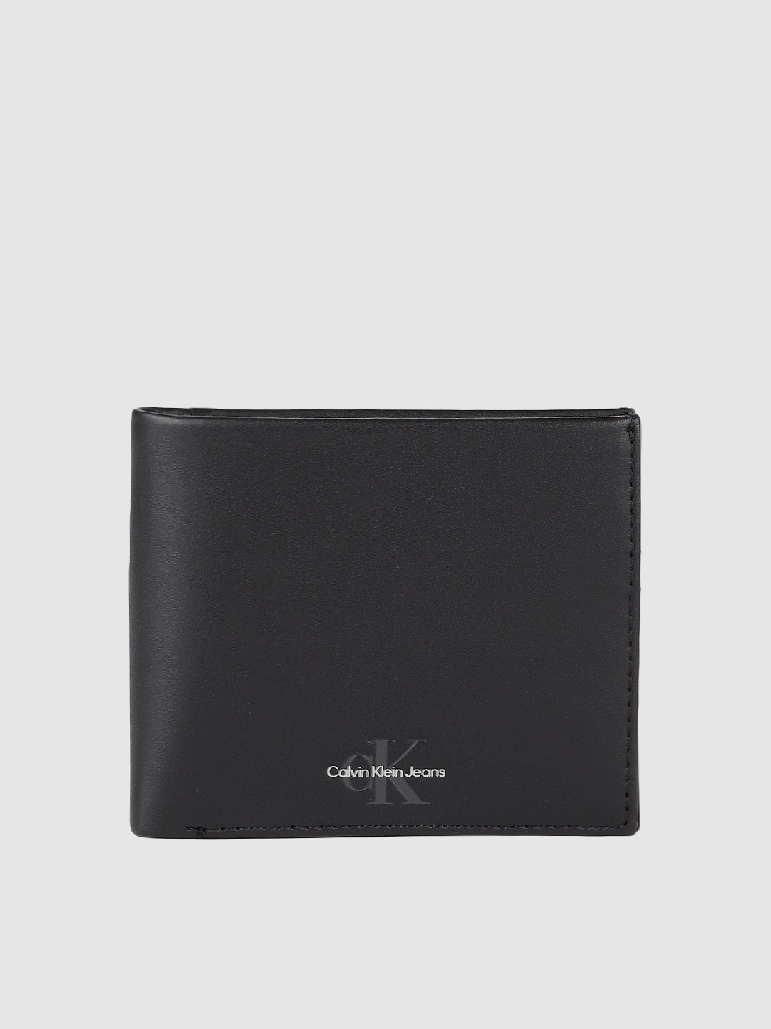 

Calvin Klein Men Minimal Brand Logo Printed Leather Two Fold Wallet, Black