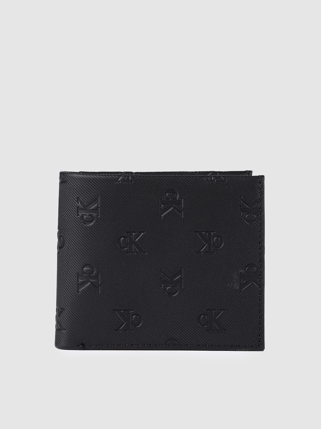 

Calvin Klein Men Brand Logo Embossed Leather Two Fold Wallet, Black