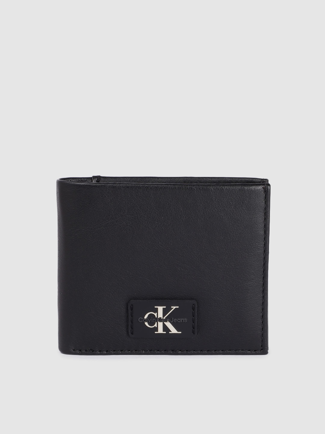 

Calvin Klein Men Leather Two Fold Wallet, Black