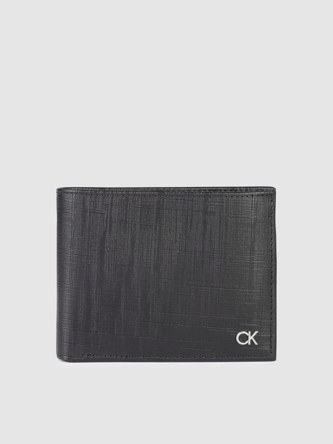

Calvin Klein Men Textured Leather Two Fold Wallet, Black