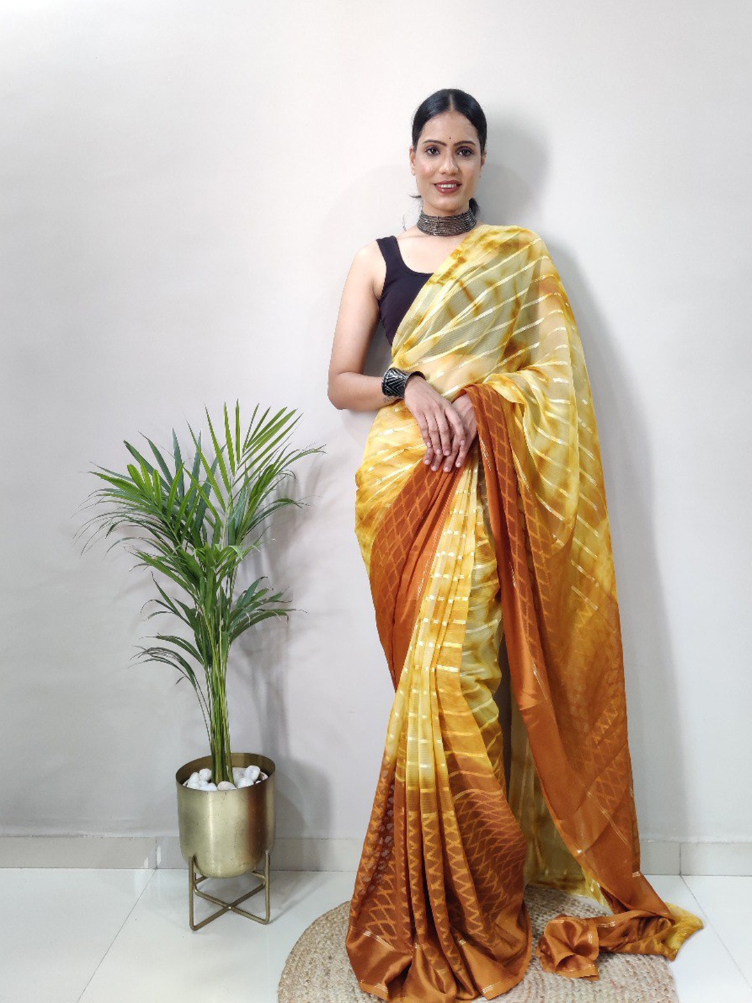 

VEERAX Striped Pure Georgette Saree, Brown