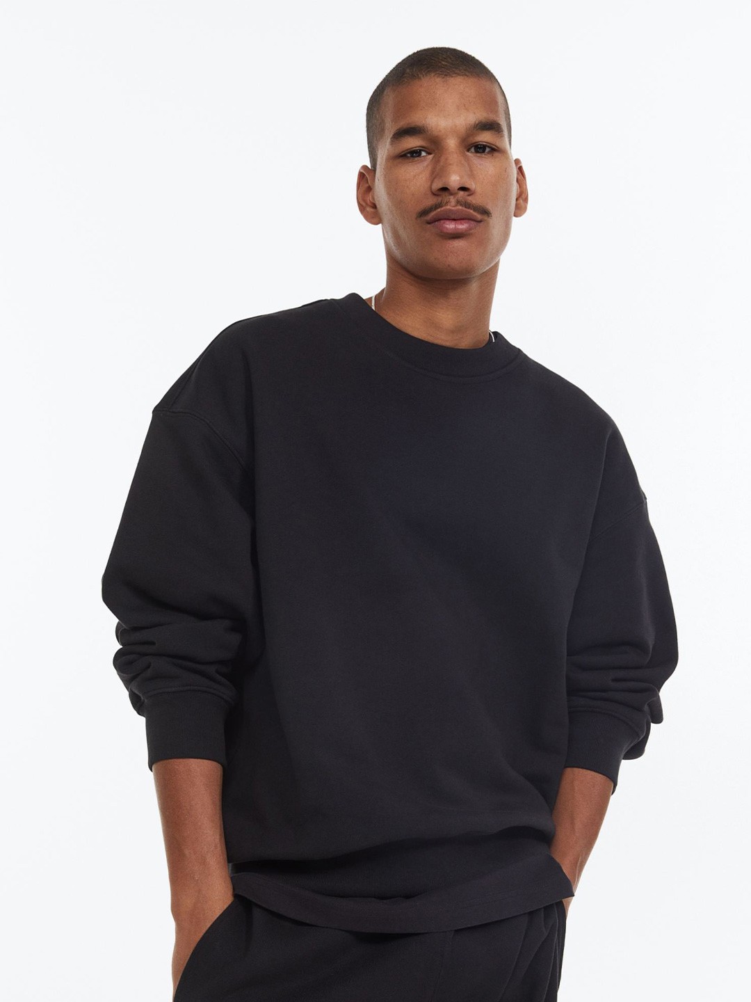 

COLOR CAPITAL Round Neck Drop Shoulder Sleeves Oversized Pullover, Black