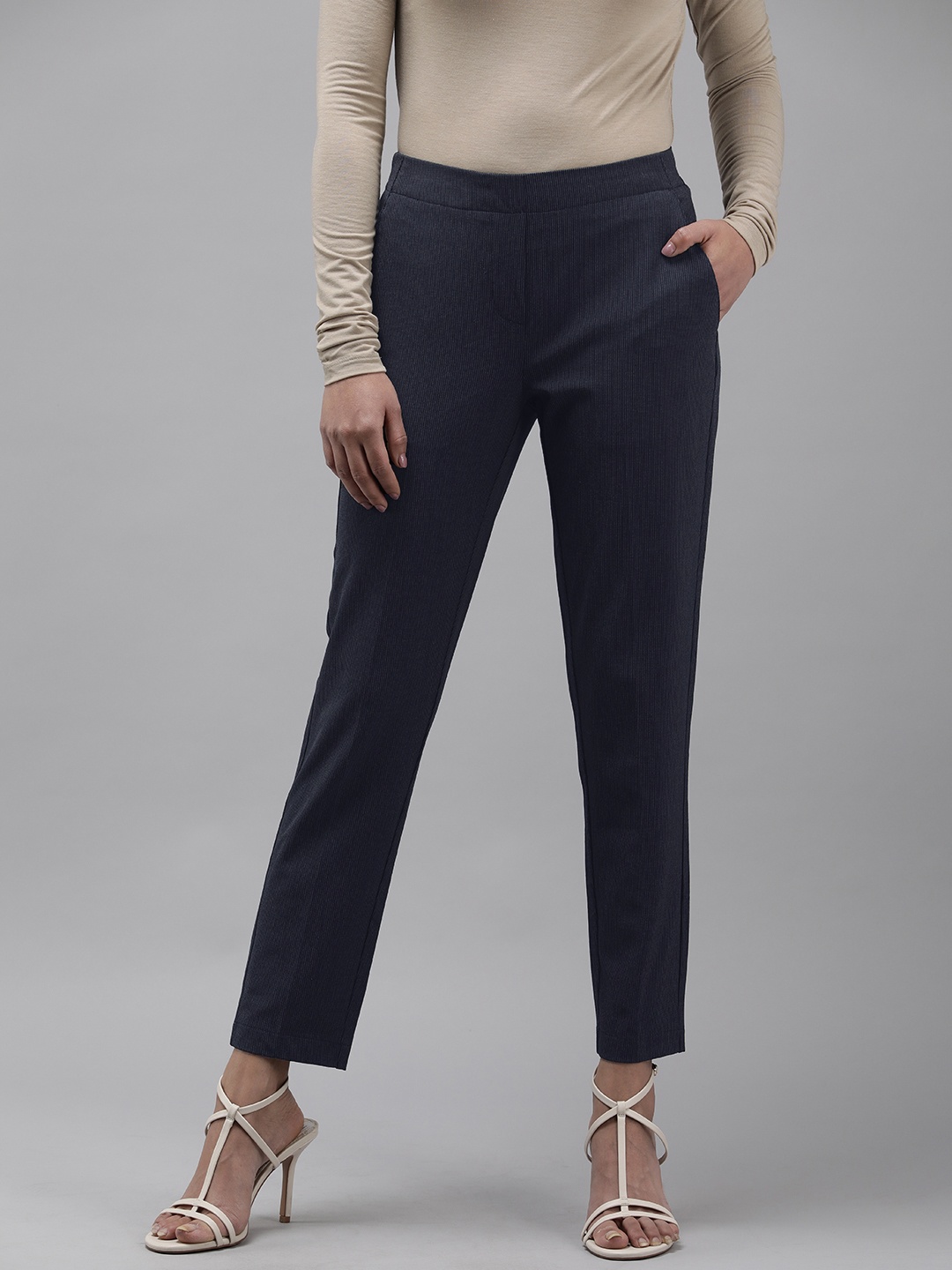 

Van Heusen Woman Self Design Textured Regular Trousers, Navy blue